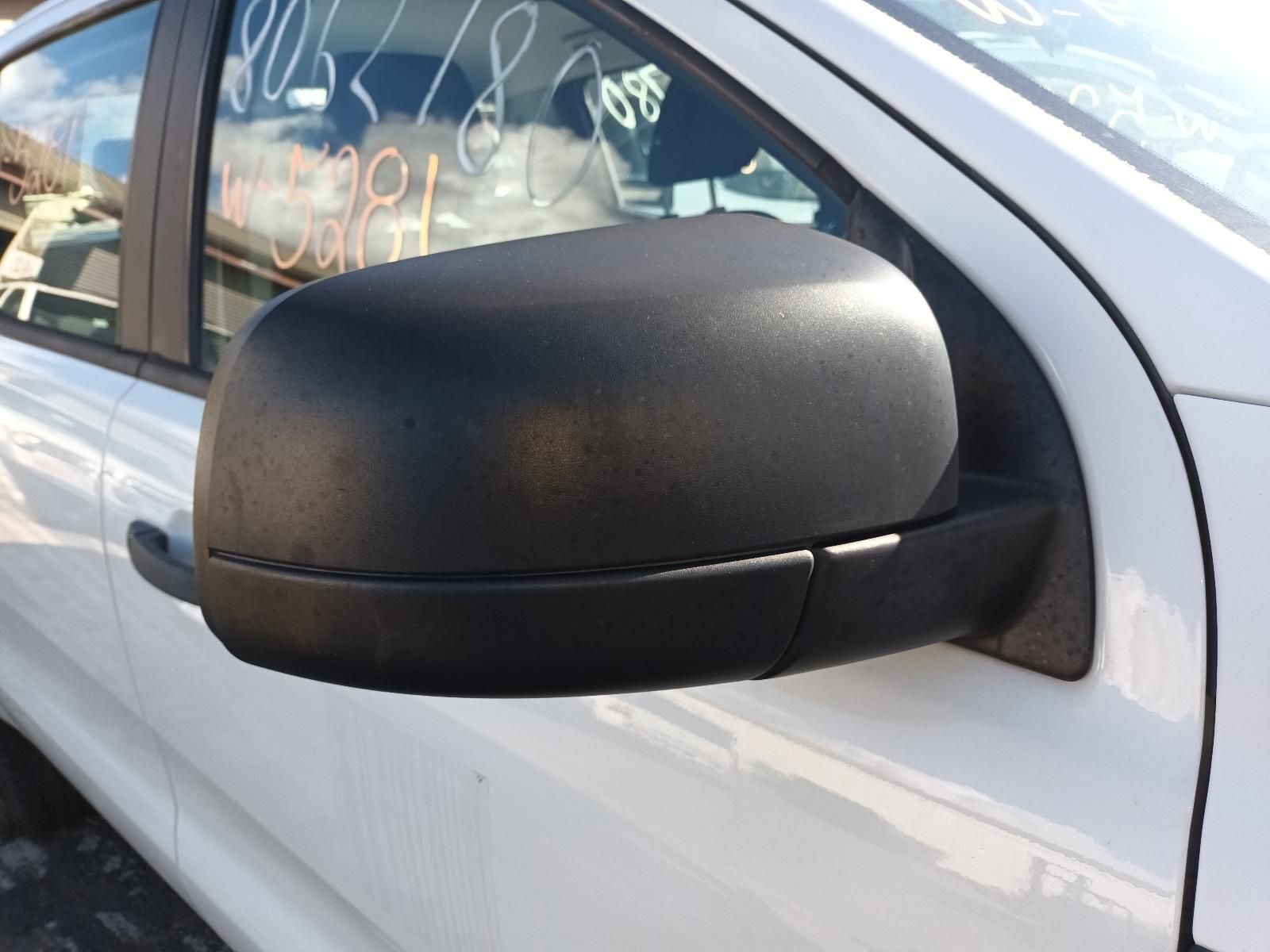 A Close Up of a Side View Mirror on a White Car — South West 4WD Wreckers In Brisbane, QLD