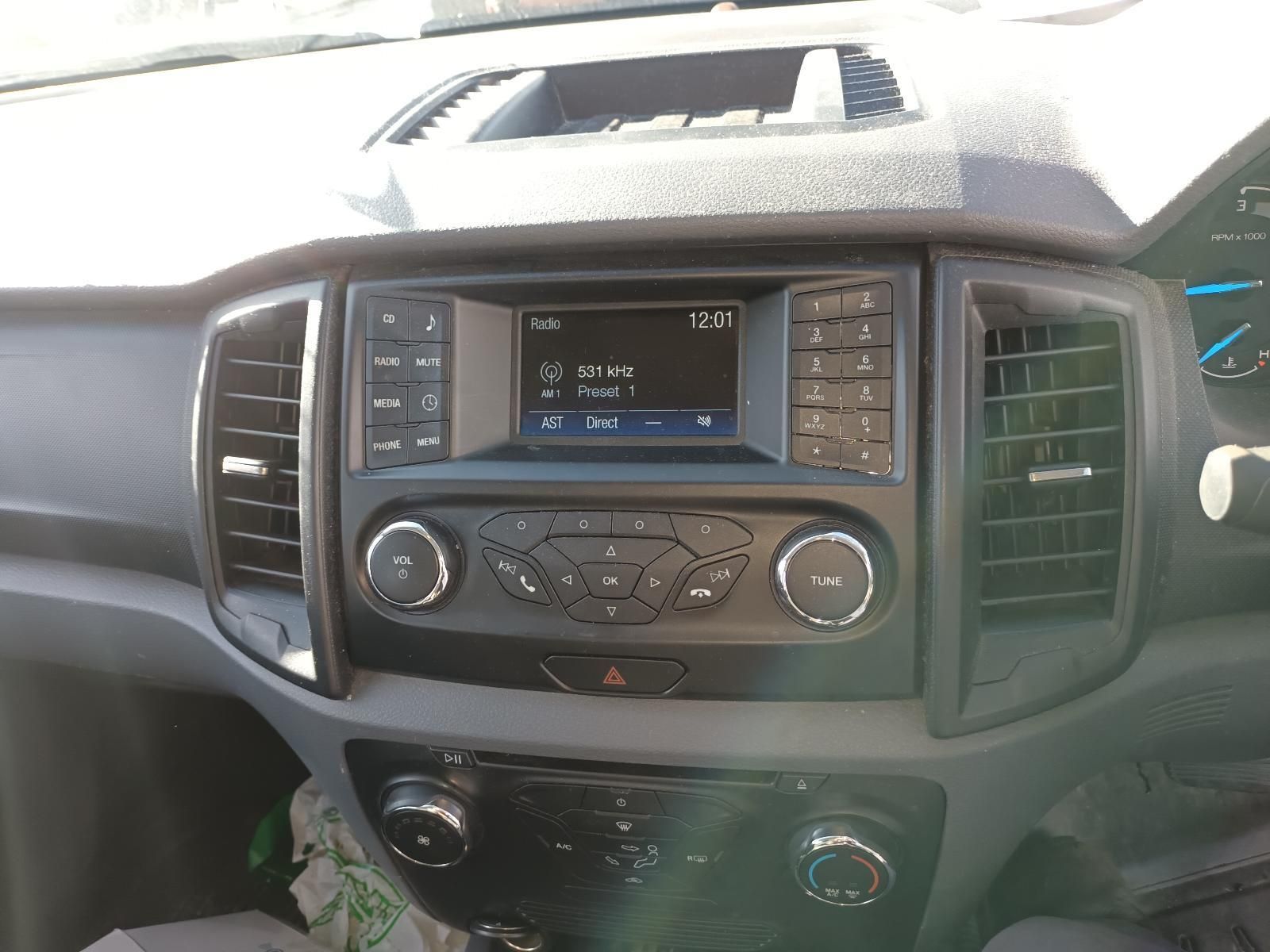 A Close Up of the Dashboard of a Car with a Radio — South West 4WD Wreckers In Brisbane, QLD