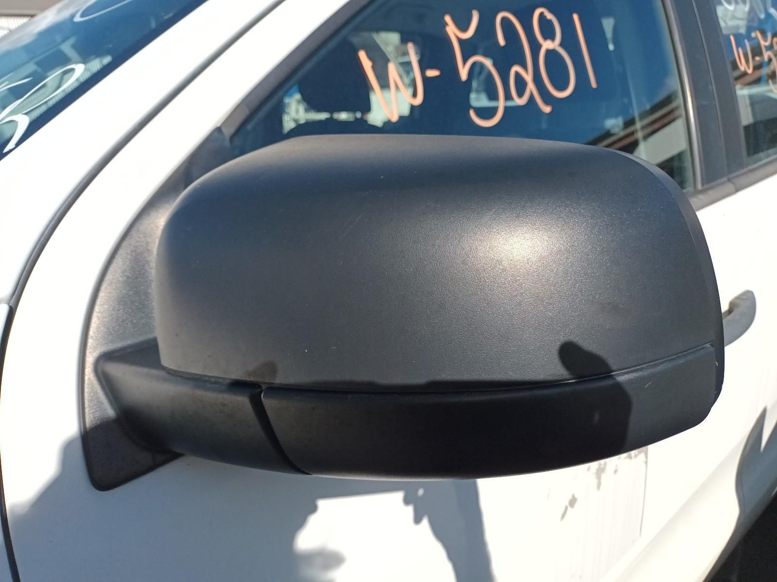 A Close Up of a Side View Mirror on a White Car — South West 4WD Wreckers In Brisbane, QLD