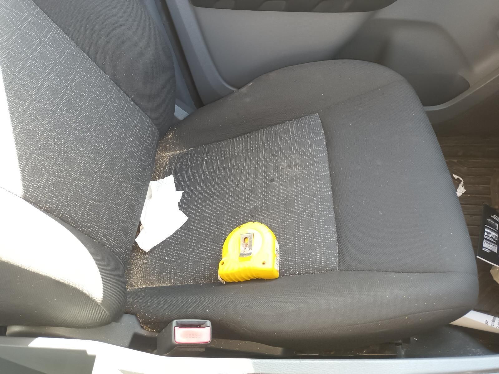 A Yellow Tape Measure is on the Seat of a Car — South West 4WD Wreckers In Brisbane, QLD