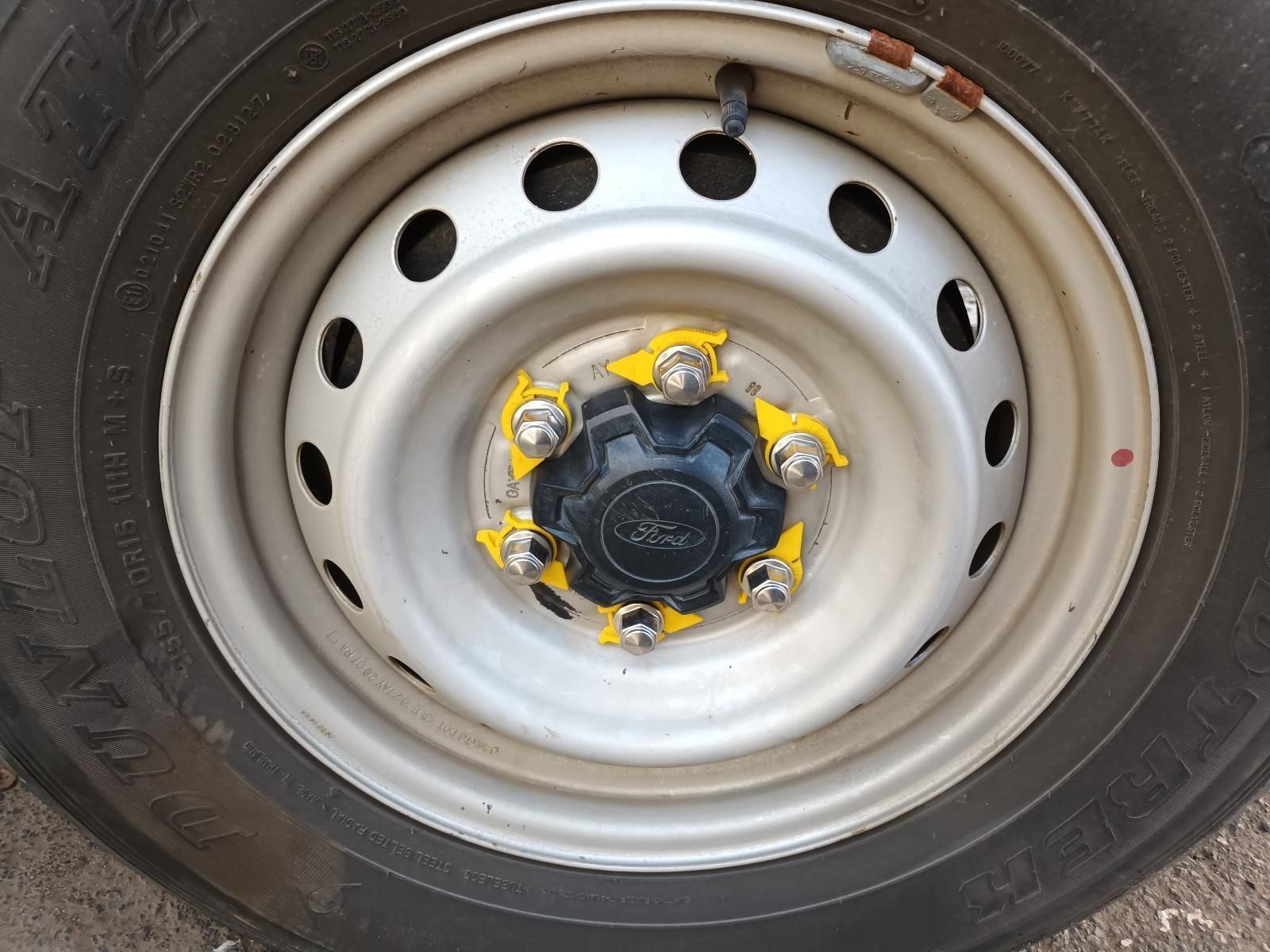 A Close Up of a Car Wheel with a Yellow Hubcap — South West 4WD Wreckers In Brisbane, QLD