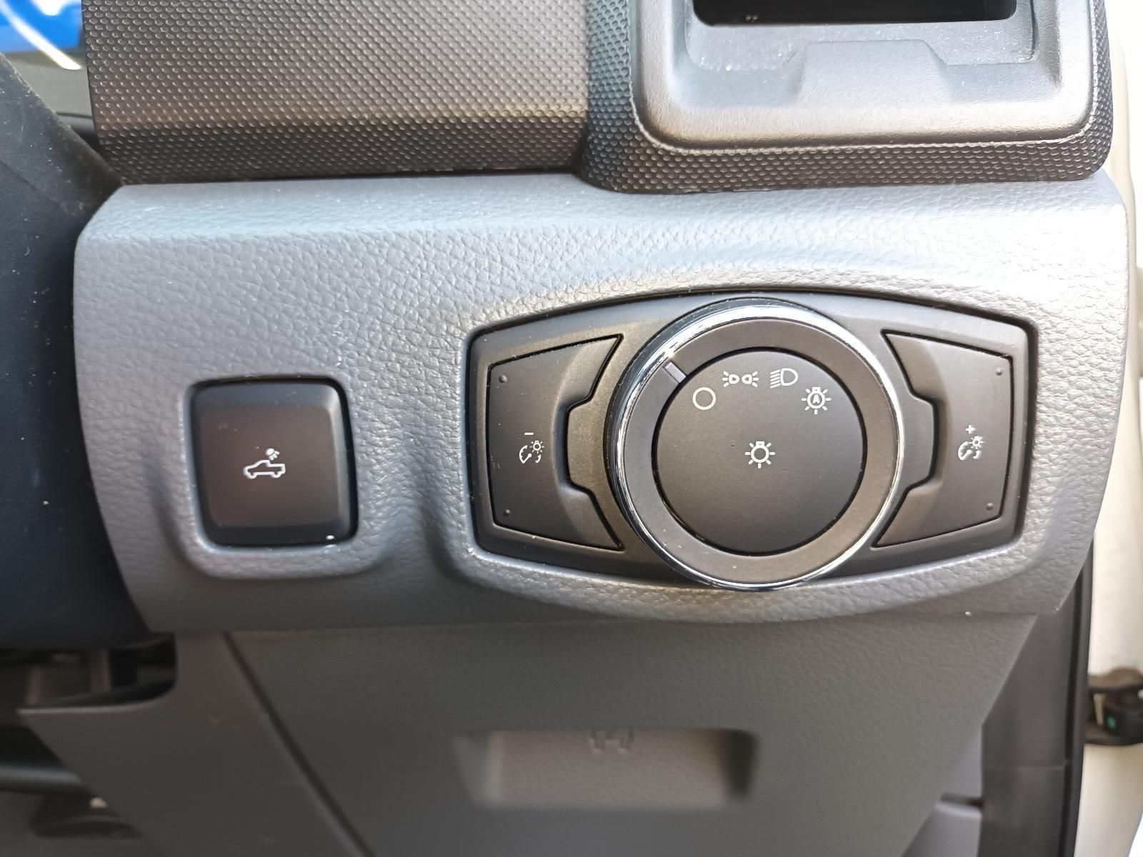 A Close Up of a Car's Dashboard with a Light Switch and a Button — South West 4WD Wreckers In Brisbane, QLD
