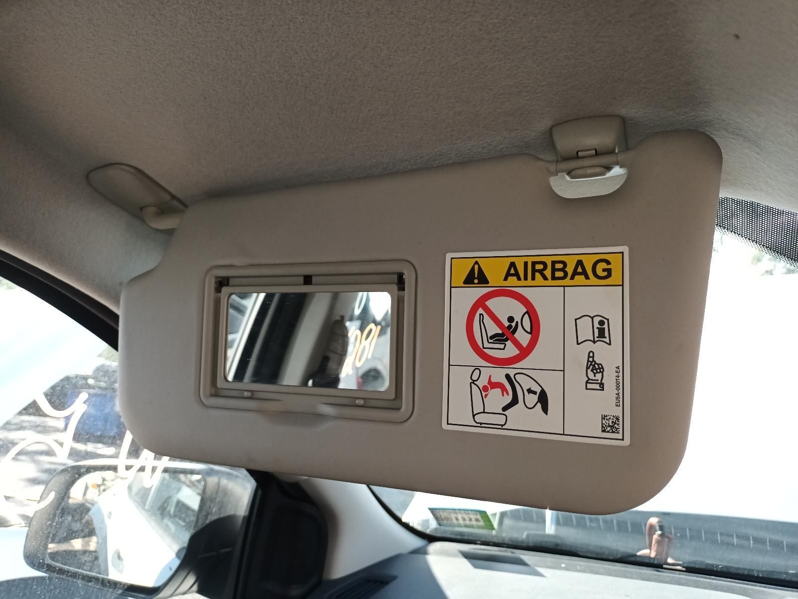 A Car Sun Visor with an Airbag Sticker on It — South West 4WD Wreckers In Brisbane, QLD