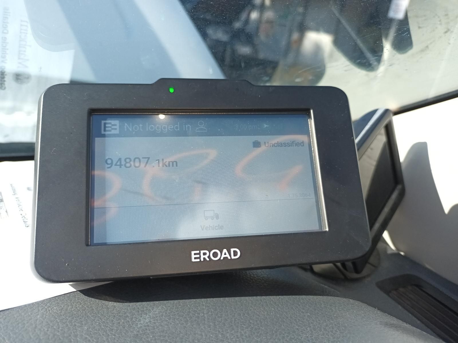 A Black EROAD Device is Sitting on the Dashboard of a Car — South West 4WD Wreckers In Brisbane, QLD