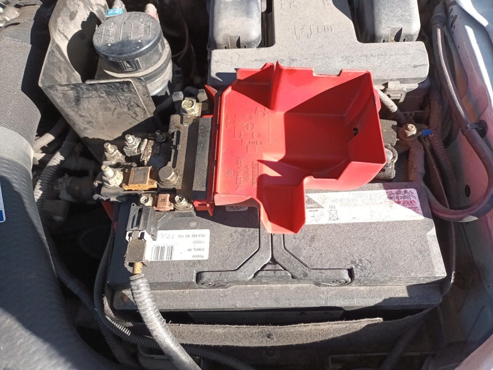 A Car Battery with a Red Tray on Top of It — South West 4WD Wreckers In Brisbane, QLD