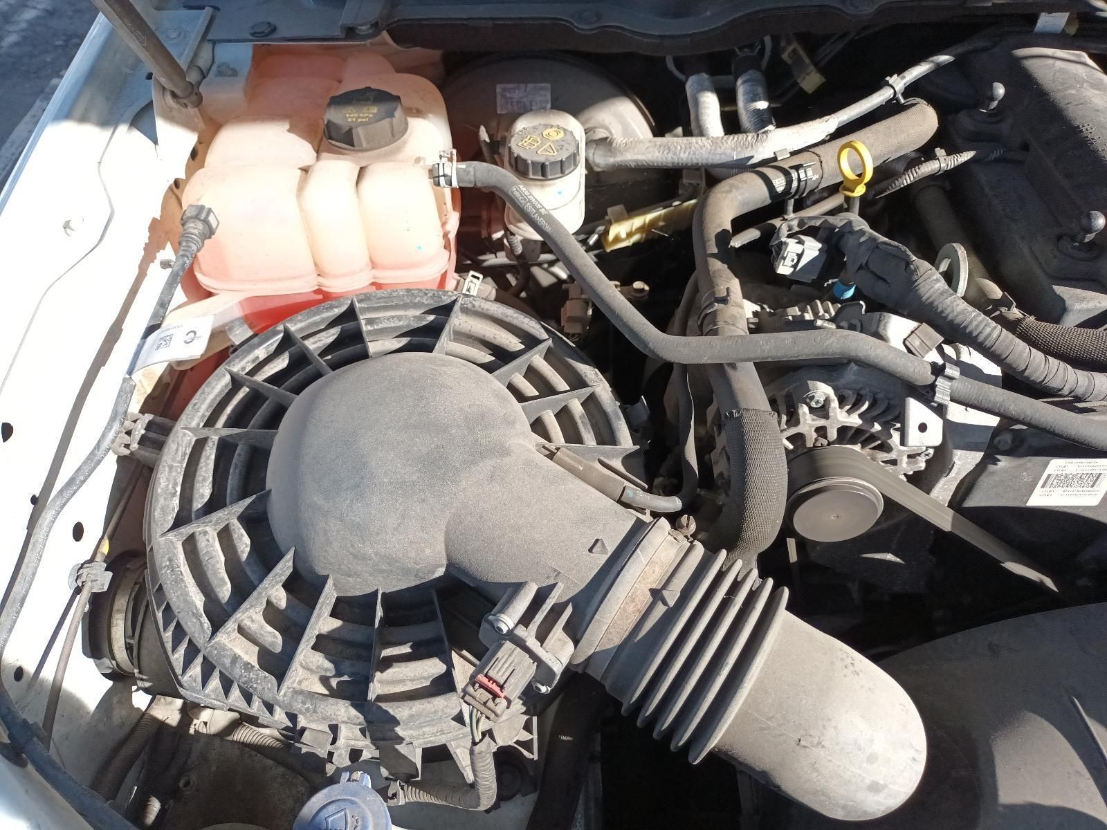 A Close Up of the Engine of a White Car — South West 4WD Wreckers In Brisbane, QLD