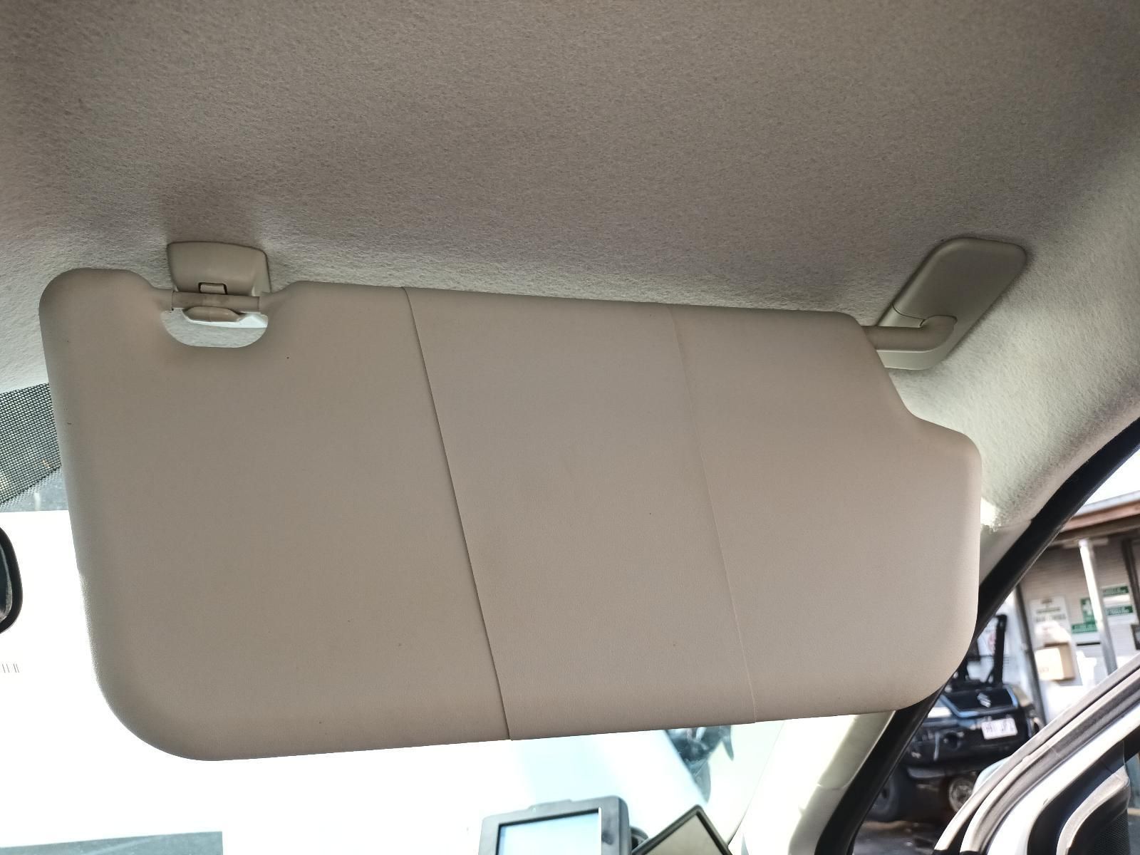 A Sun Visor is Hanging from the Ceiling of a Car — South West 4WD Wreckers In Brisbane, QLD