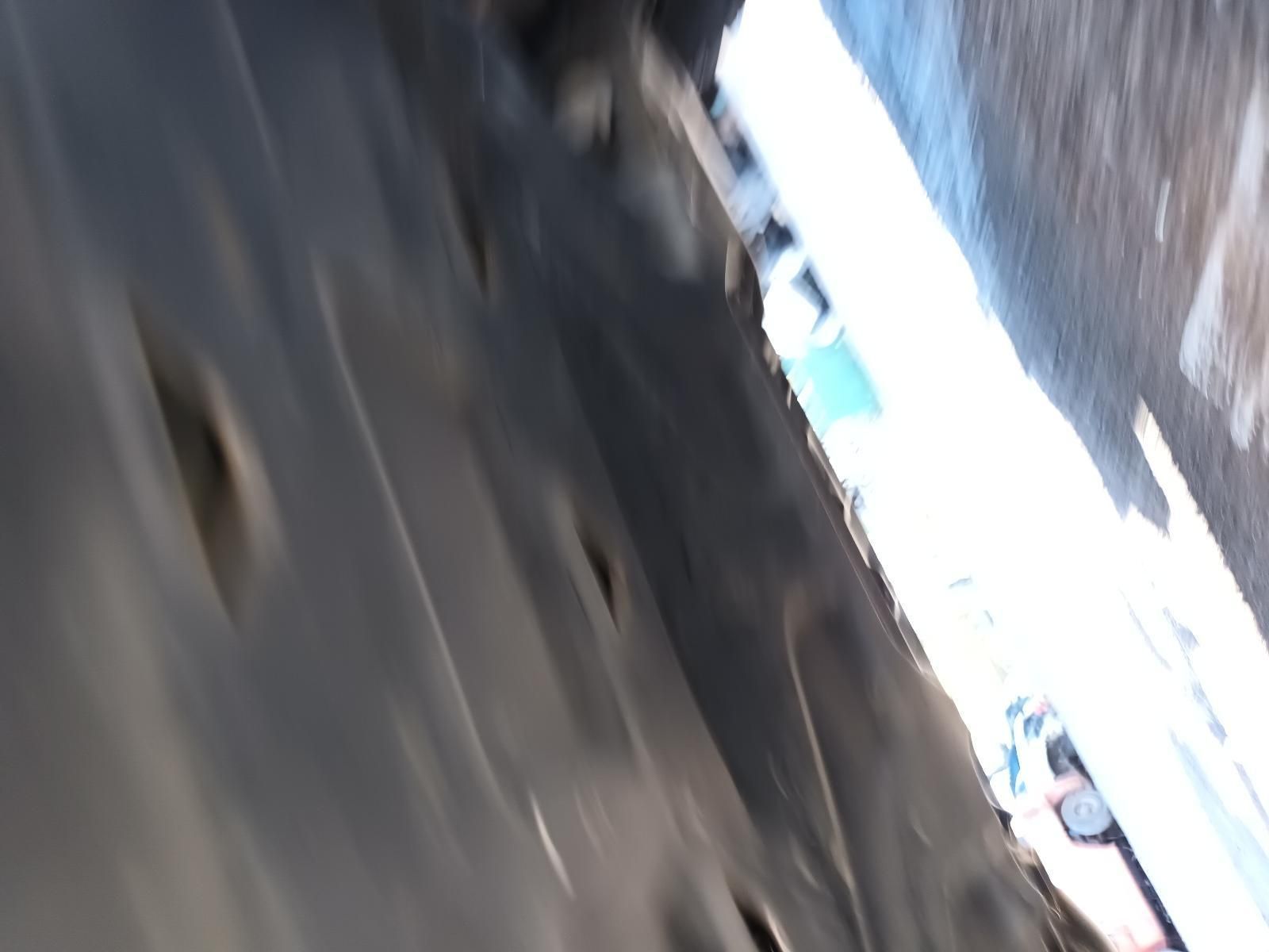 A Blurred Image of a Person Walking Down a Street — South West 4WD Wreckers In Brisbane, QLD