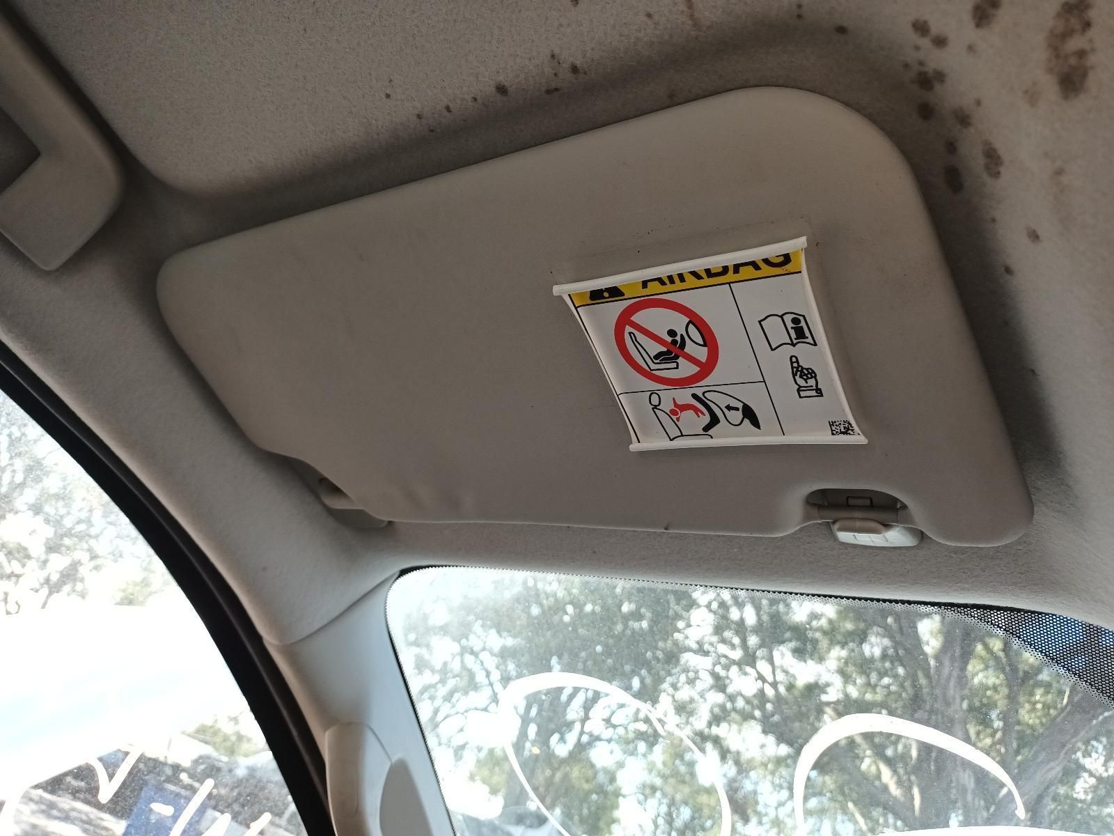 A Sun Visor in a Car with a Warning Sticker on It — South West 4WD Wreckers In Brisbane, QLD