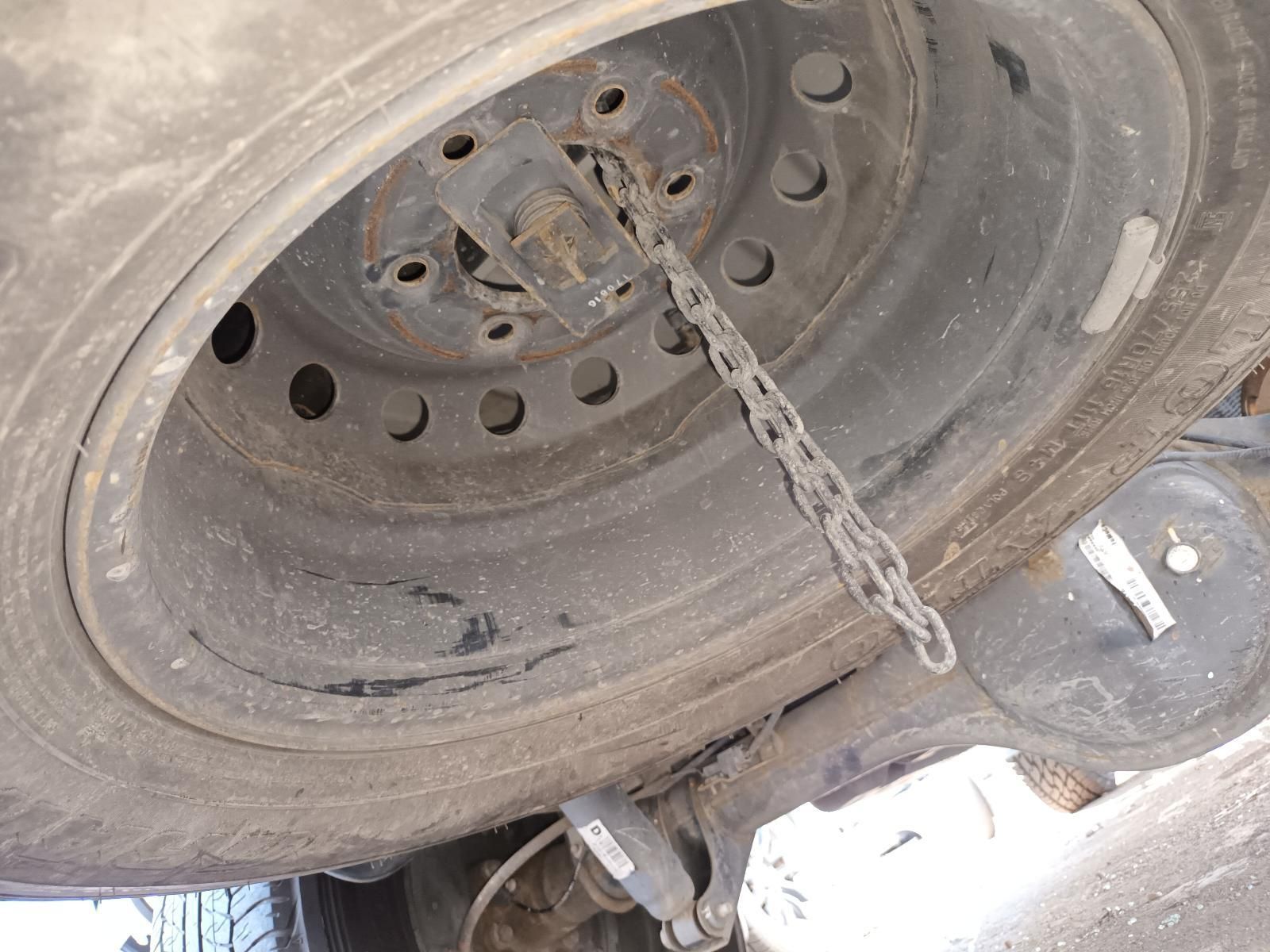 A Close Up of a Tire with a Chain Attached to It — South West 4WD Wreckers In Brisbane, QLD