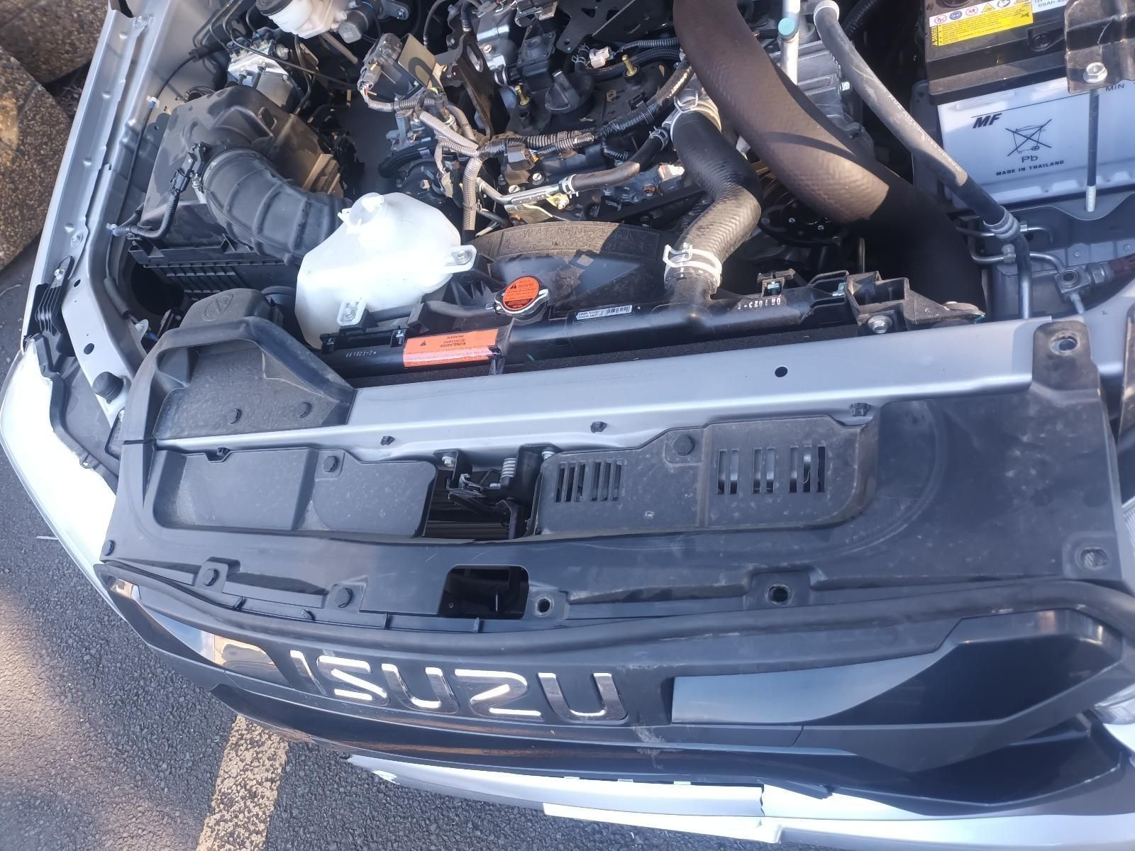 The Hood of an Isuzu Car is Open and Shows the Engine — South West 4WD Wreckers In Brisbane, QLD