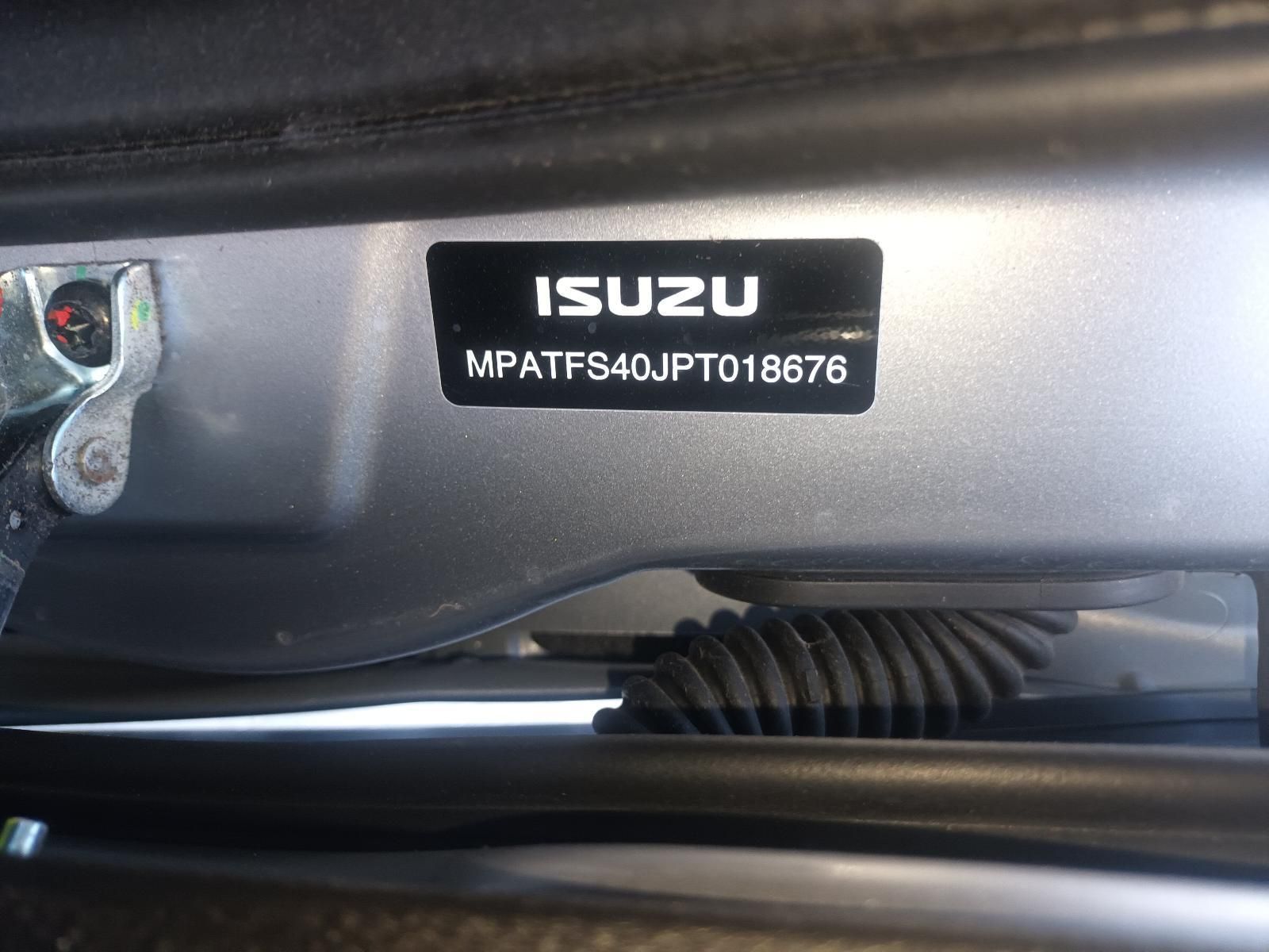 A Close Up of a Sticker on the Side of a Car That Says Isuzu — South West 4WD Wreckers In Brisbane, QLD