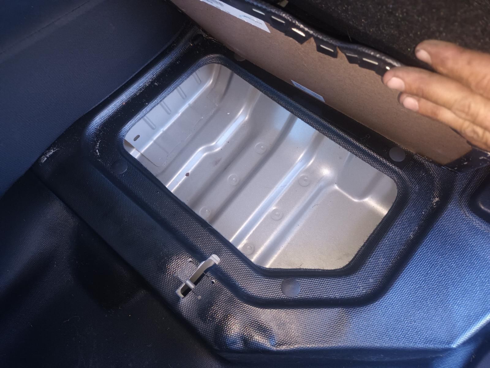 A Person is Opening the Trunk of a Car — South West 4WD Wreckers In Brisbane, QLD