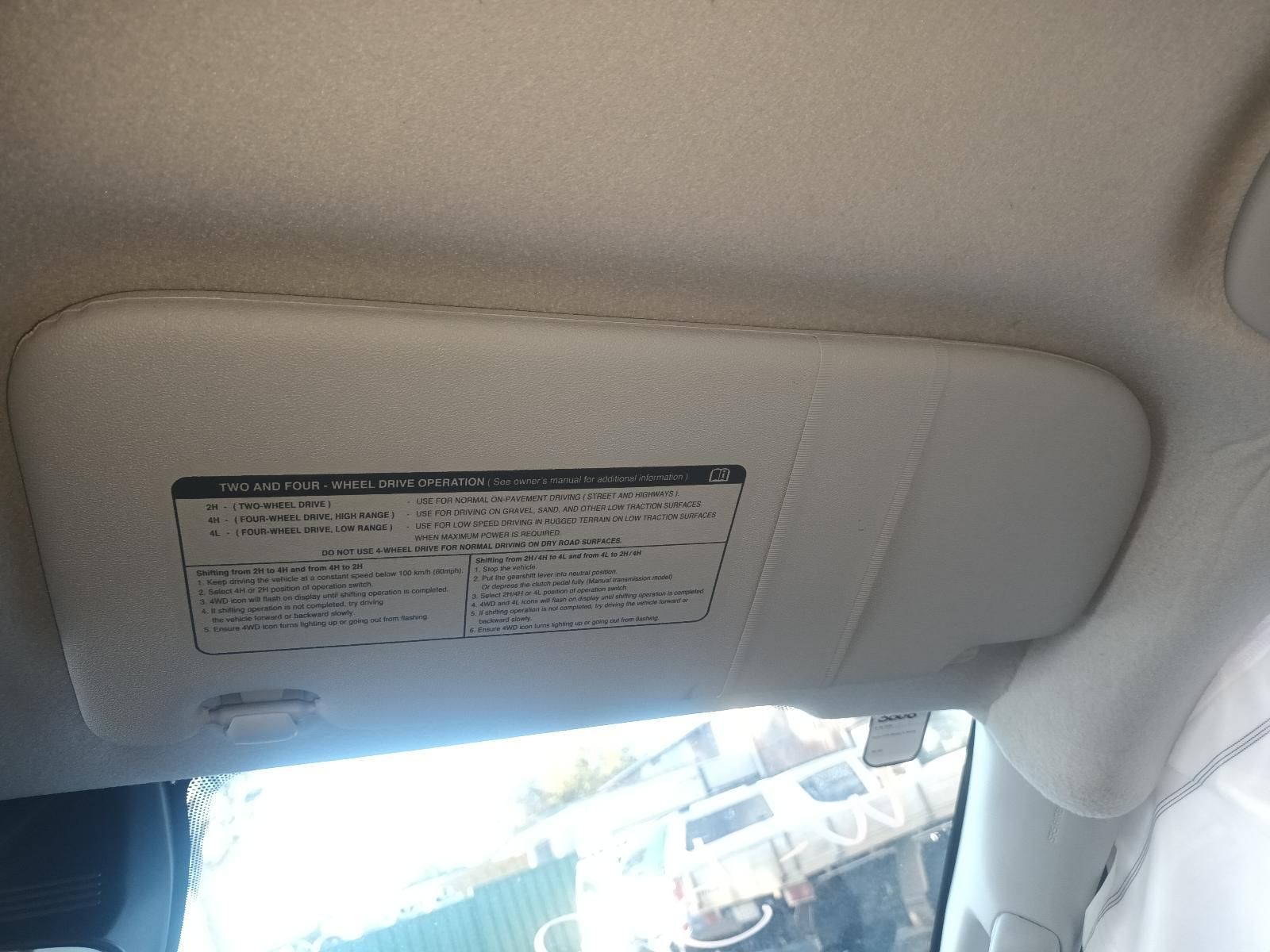 A Sun Visor is Hanging from the Ceiling of a Car — South West 4WD Wreckers In Brisbane, QLD 