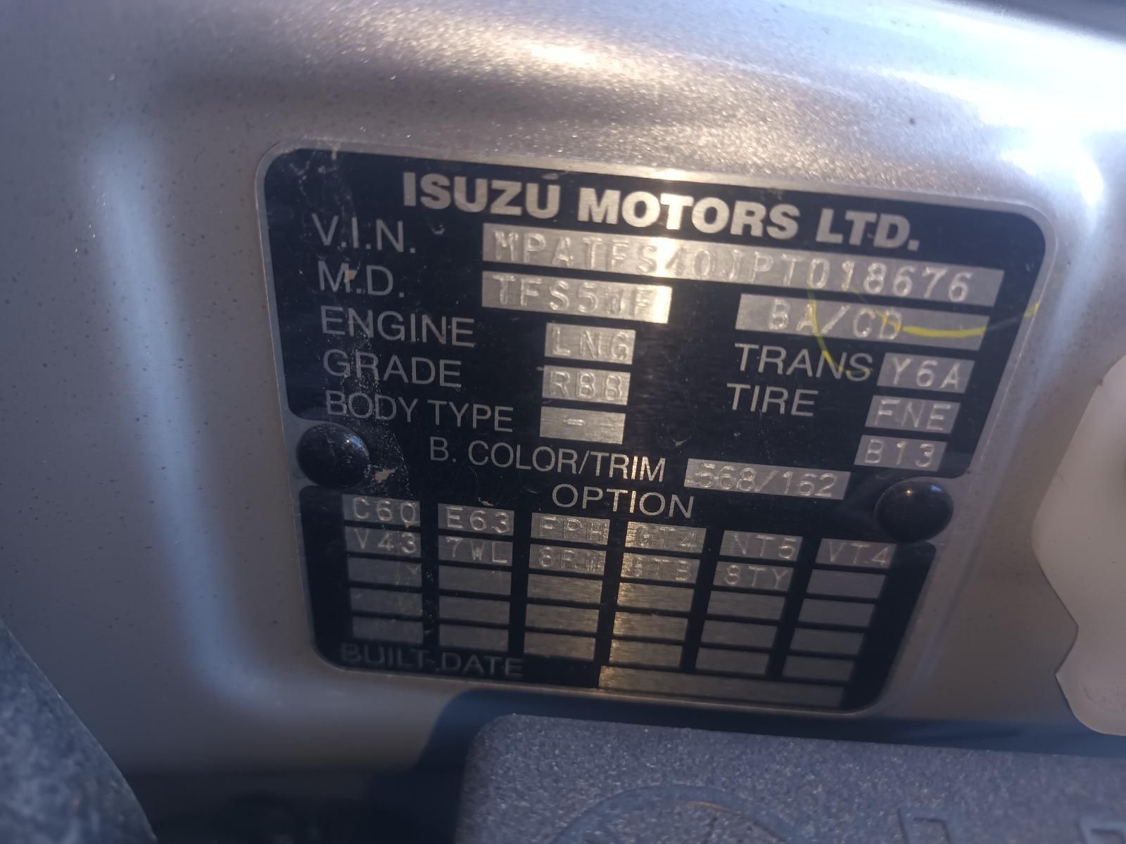 A Close Up of a Isuzu Motors Ltd License Plate — South West 4WD Wreckers In Brisbane, QLD