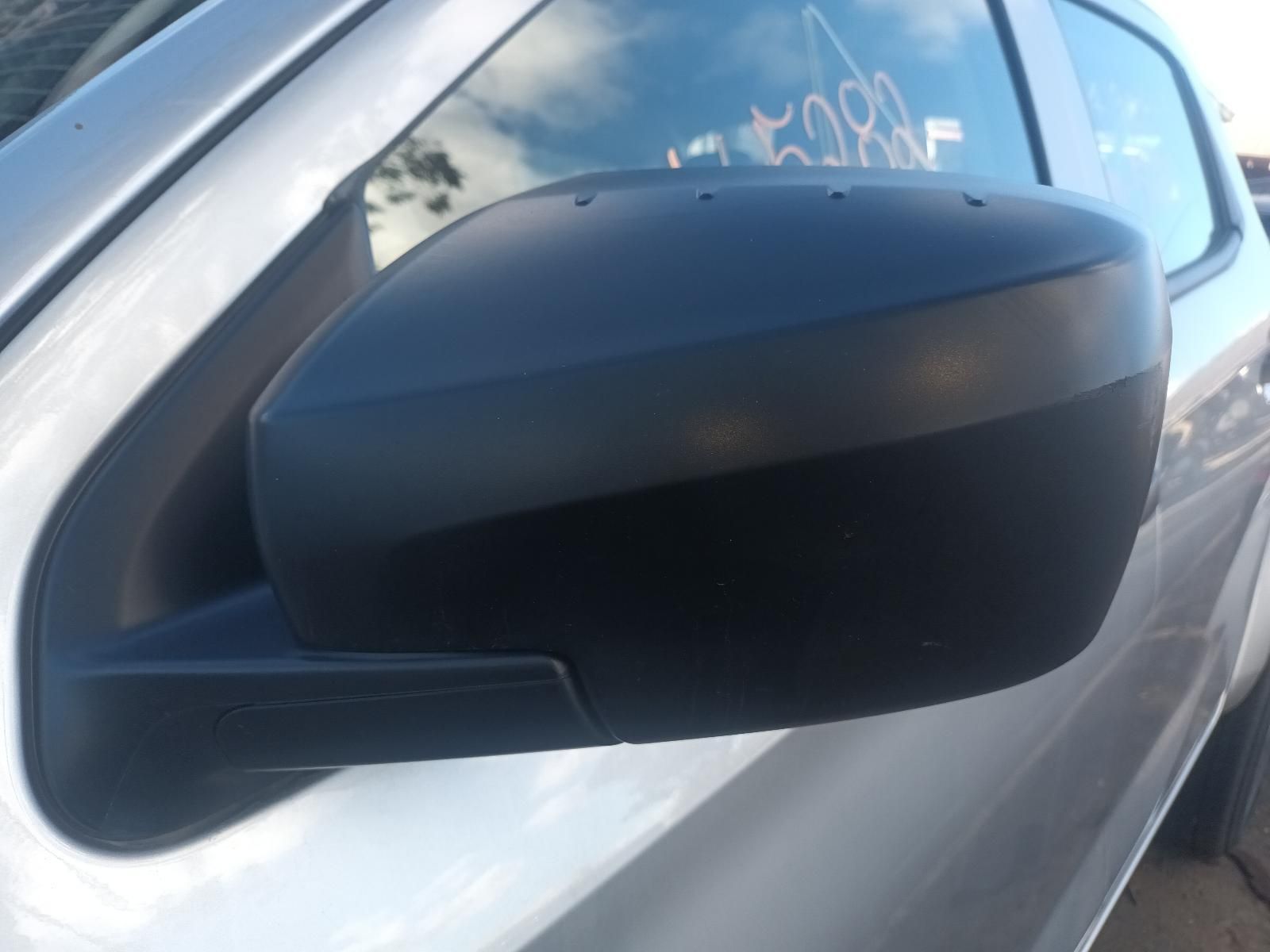 A Close Up of a Side View Mirror on a Silver Car — South West 4WD Wreckers In Brisbane, QLD