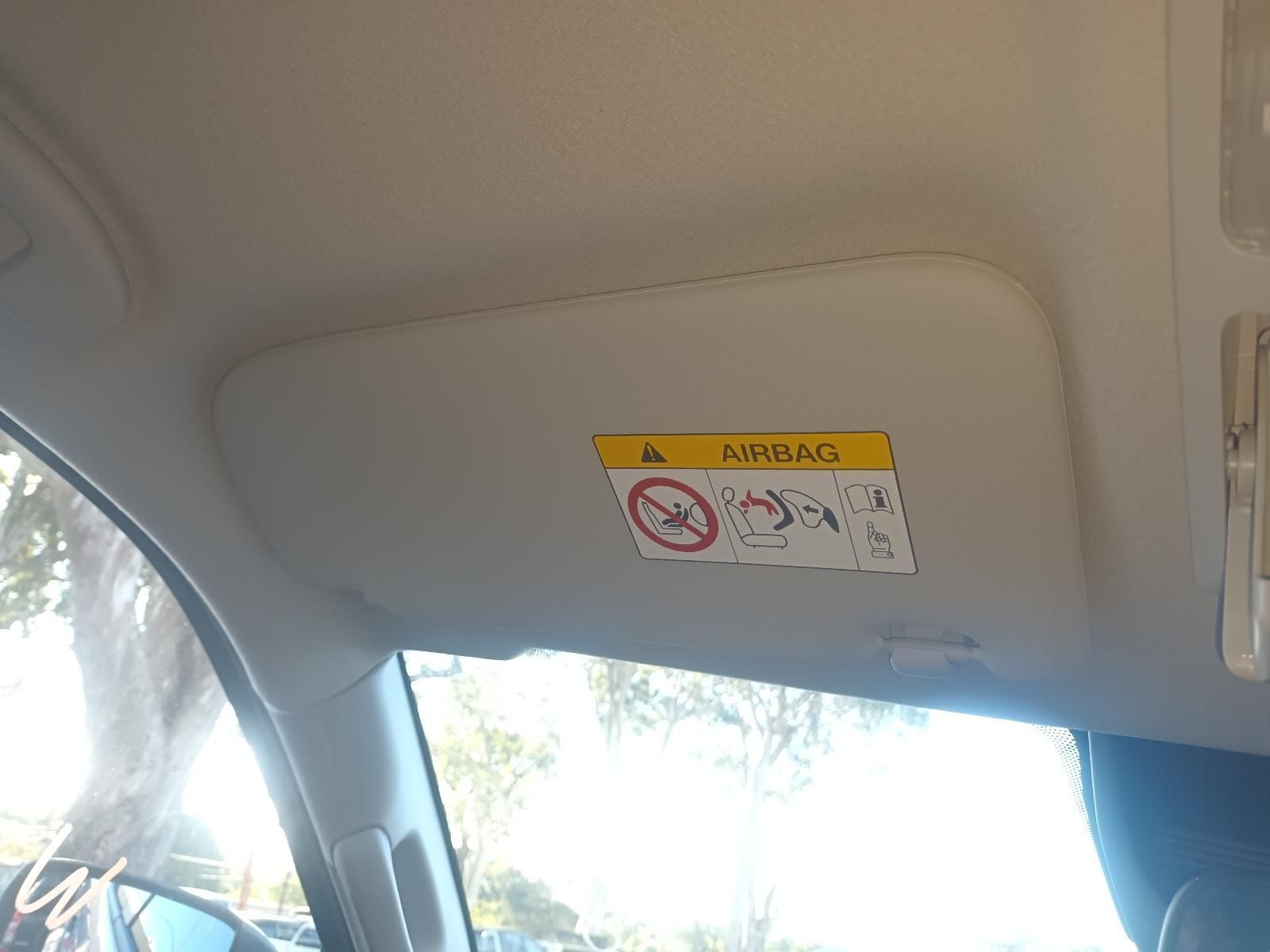 A Car Sun Visor with a Warning Sticker on It. — South West 4WD Wreckers In Brisbane, QLD