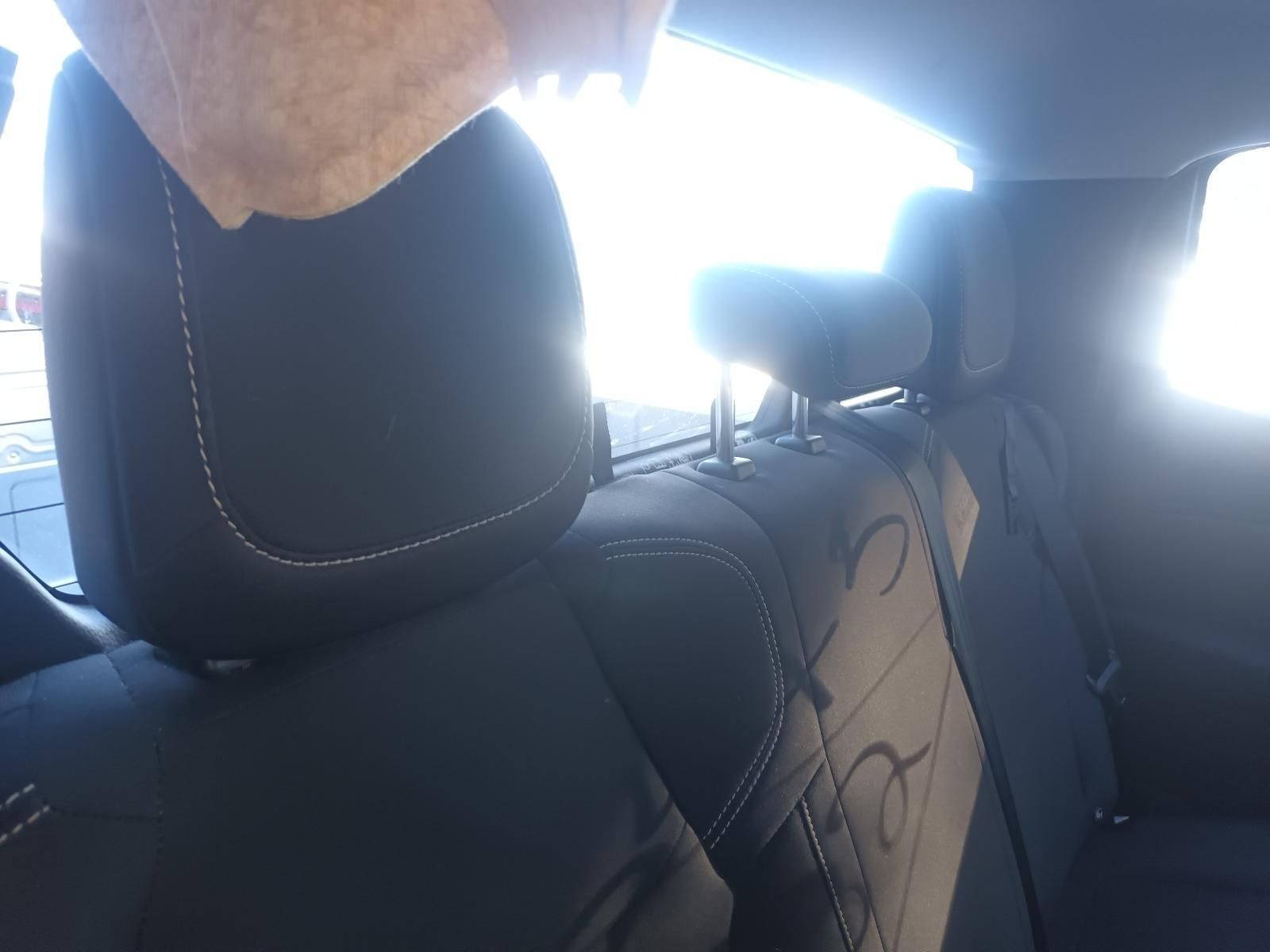 A Person is Sitting in the Back Seat of a Car — South West 4WD Wreckers In Brisbane, QLD