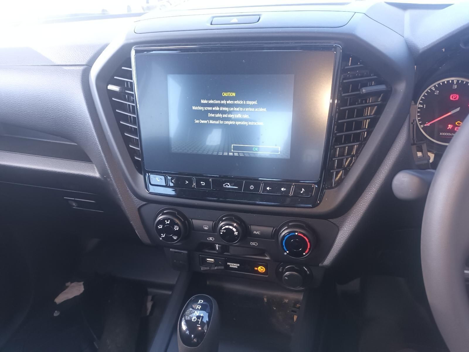 The Dashboard of a Car with a Warning Message on the Screen — South West 4WD Wreckers In Brisbane, QLD