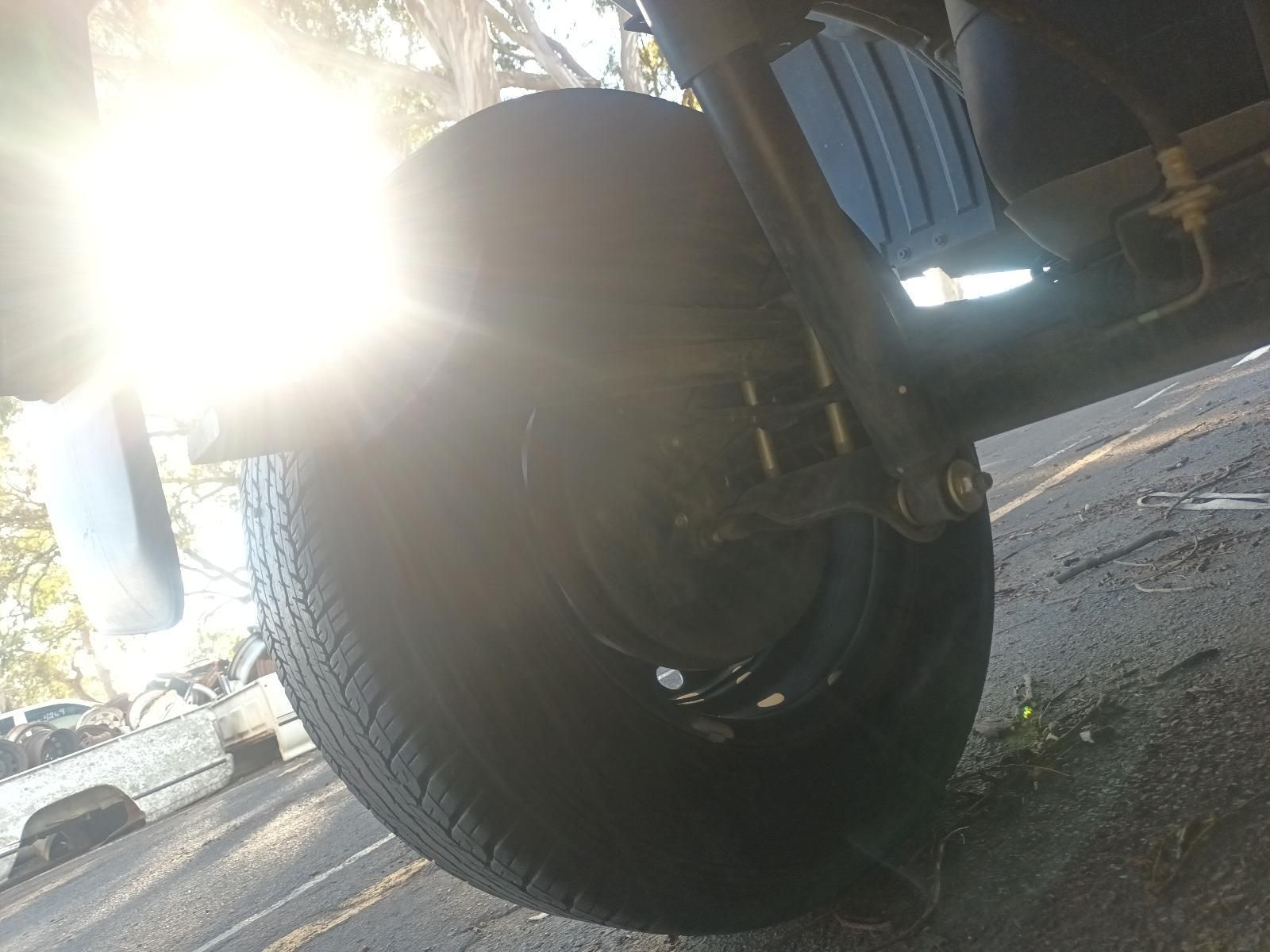 A Close Up of a Motorcycle Wheel on a Street — South West 4WD Wreckers In Brisbane, QLD