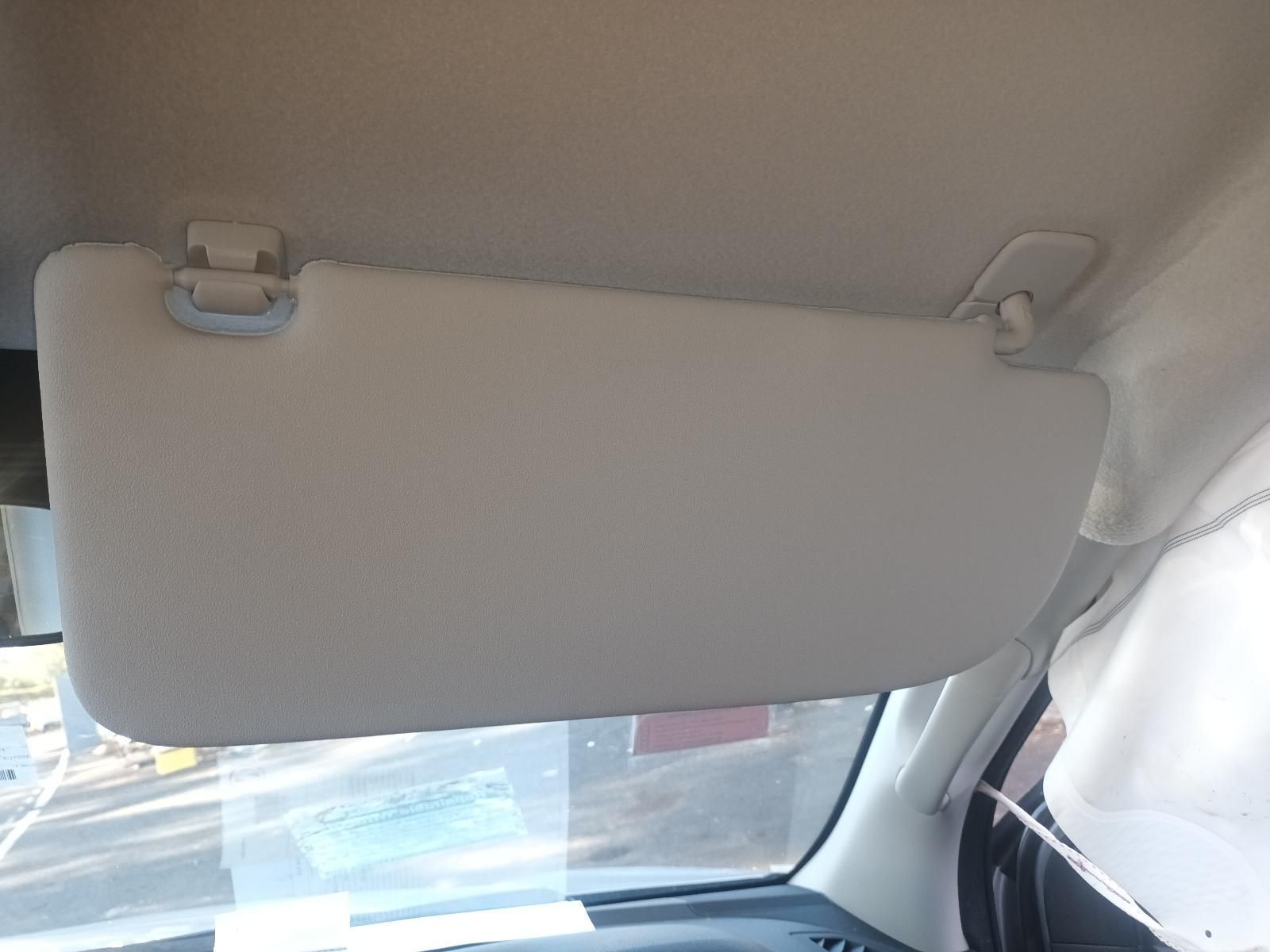 A Sun Visor is Hanging from the Ceiling of a Car — South West 4WD Wreckers In Brisbane, QLD