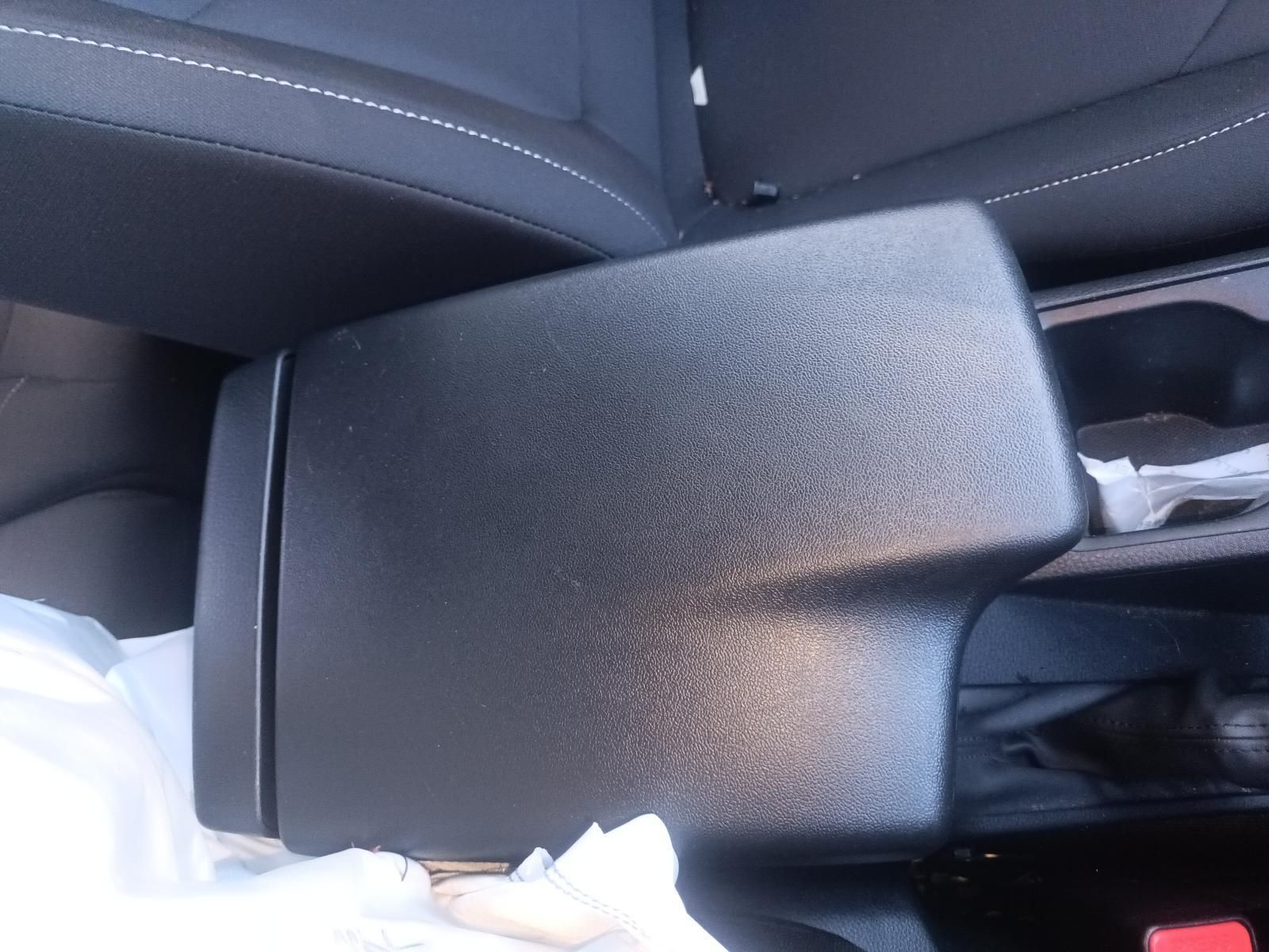A Black Arm Rest in a Car with Tissues in It — South West 4WD Wreckers In Brisbane, QLD
