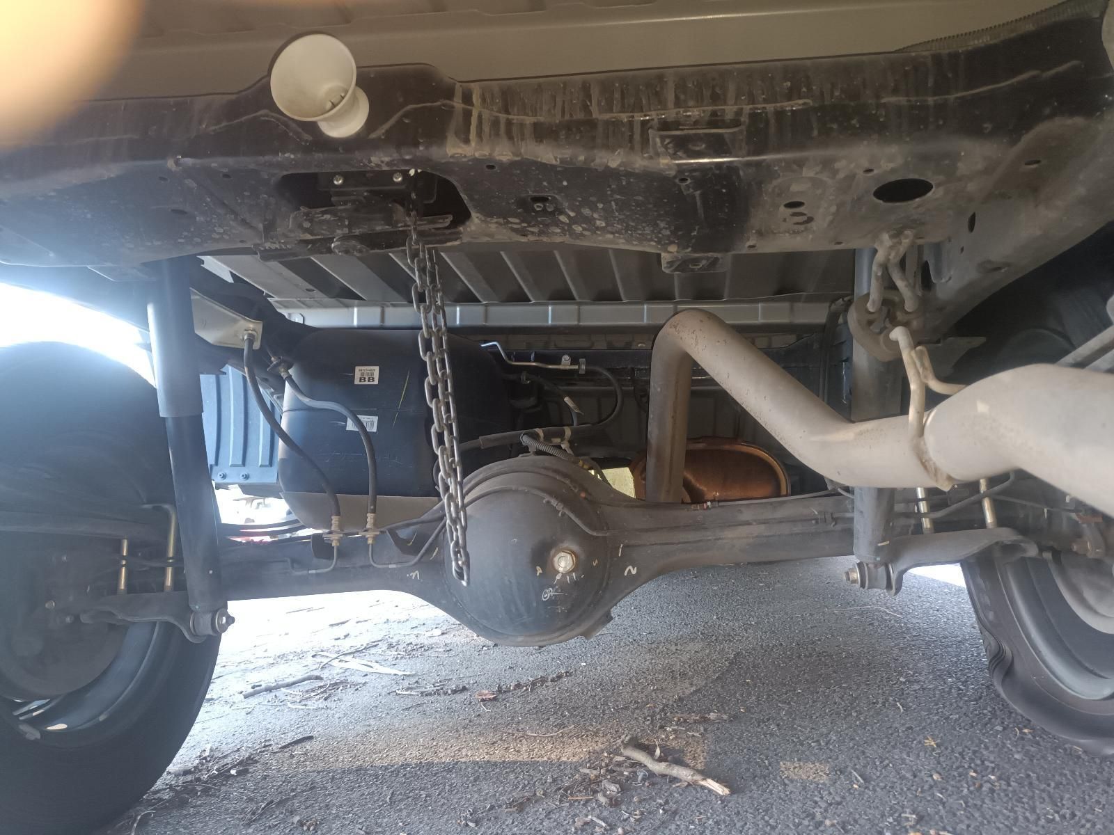 The Underside of a Truck with a Chain Attached to It — South West 4WD Wreckers In Brisbane, QLD