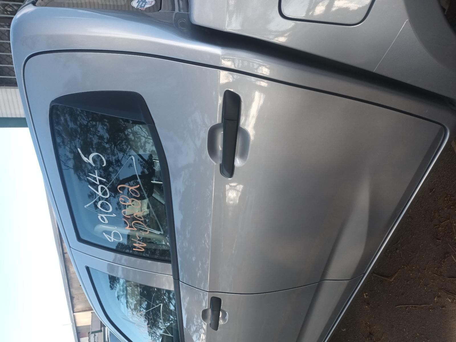 A Silver Car with a Sticker on the Door That Says Ep065 — South West 4WD Wreckers In Brisbane, QLD