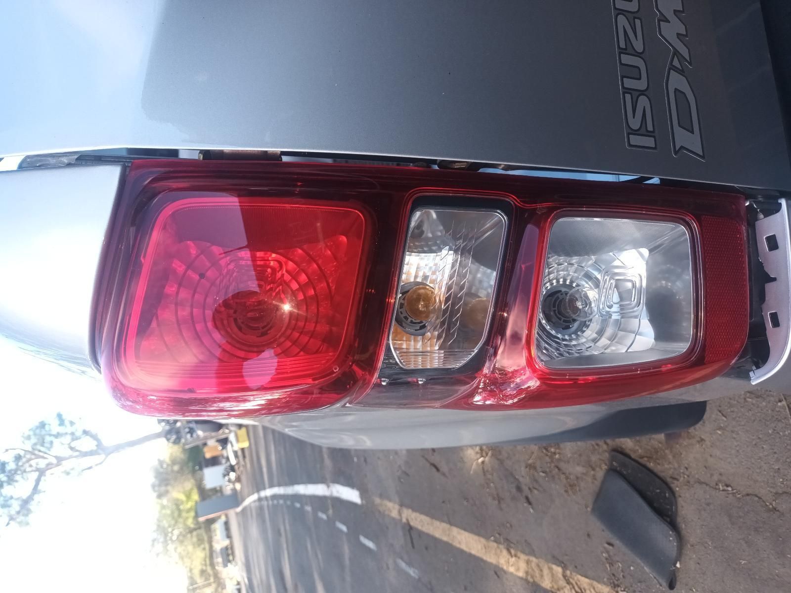 A Close Up of a Car 's Tail Light on the Side of the Road — South West 4WD Wreckers In Brisbane, QLD