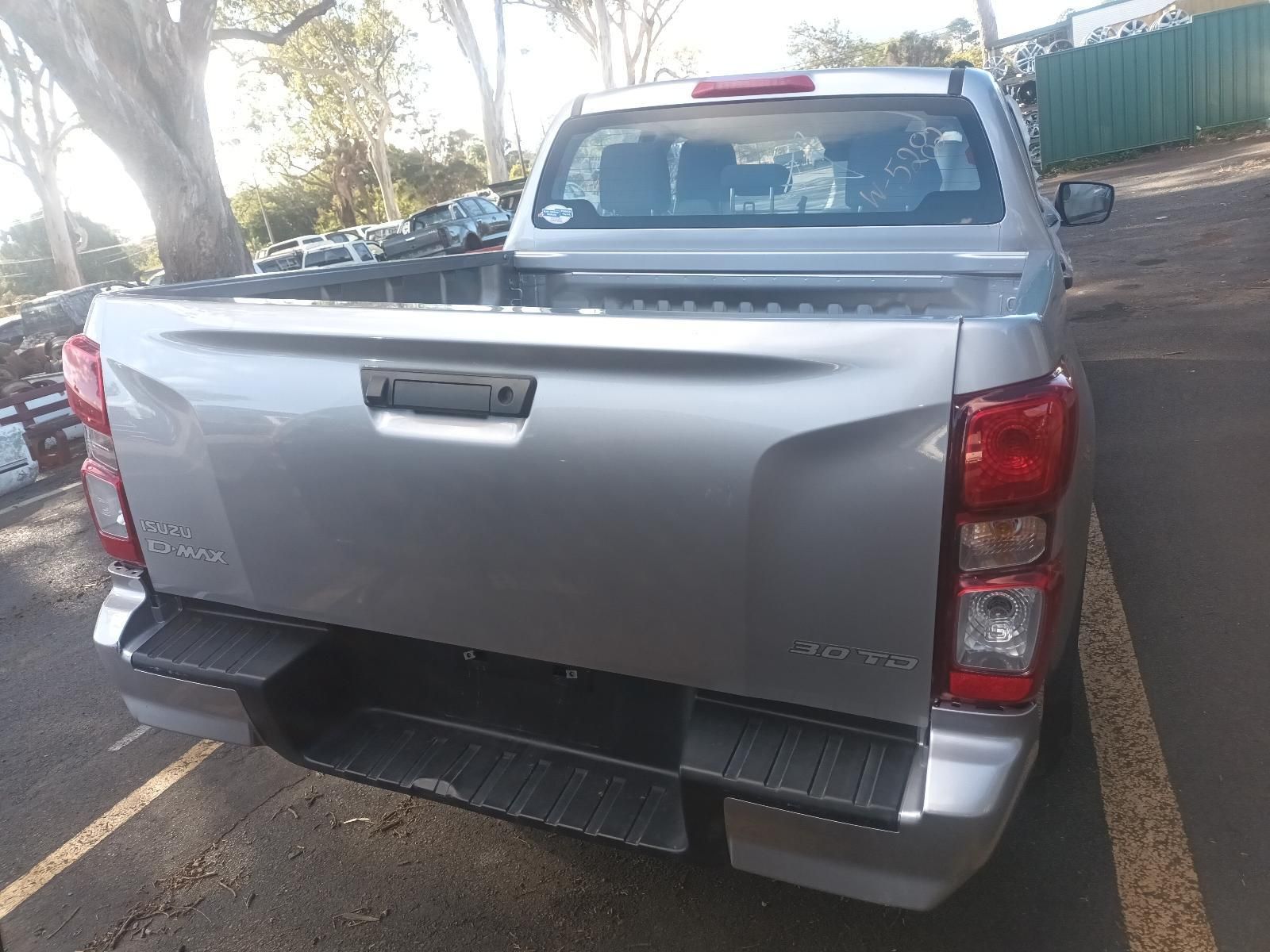 A Silver Pickup Truck is Parked in a Parking Lot — South West 4WD Wreckers In Brisbane, QLD