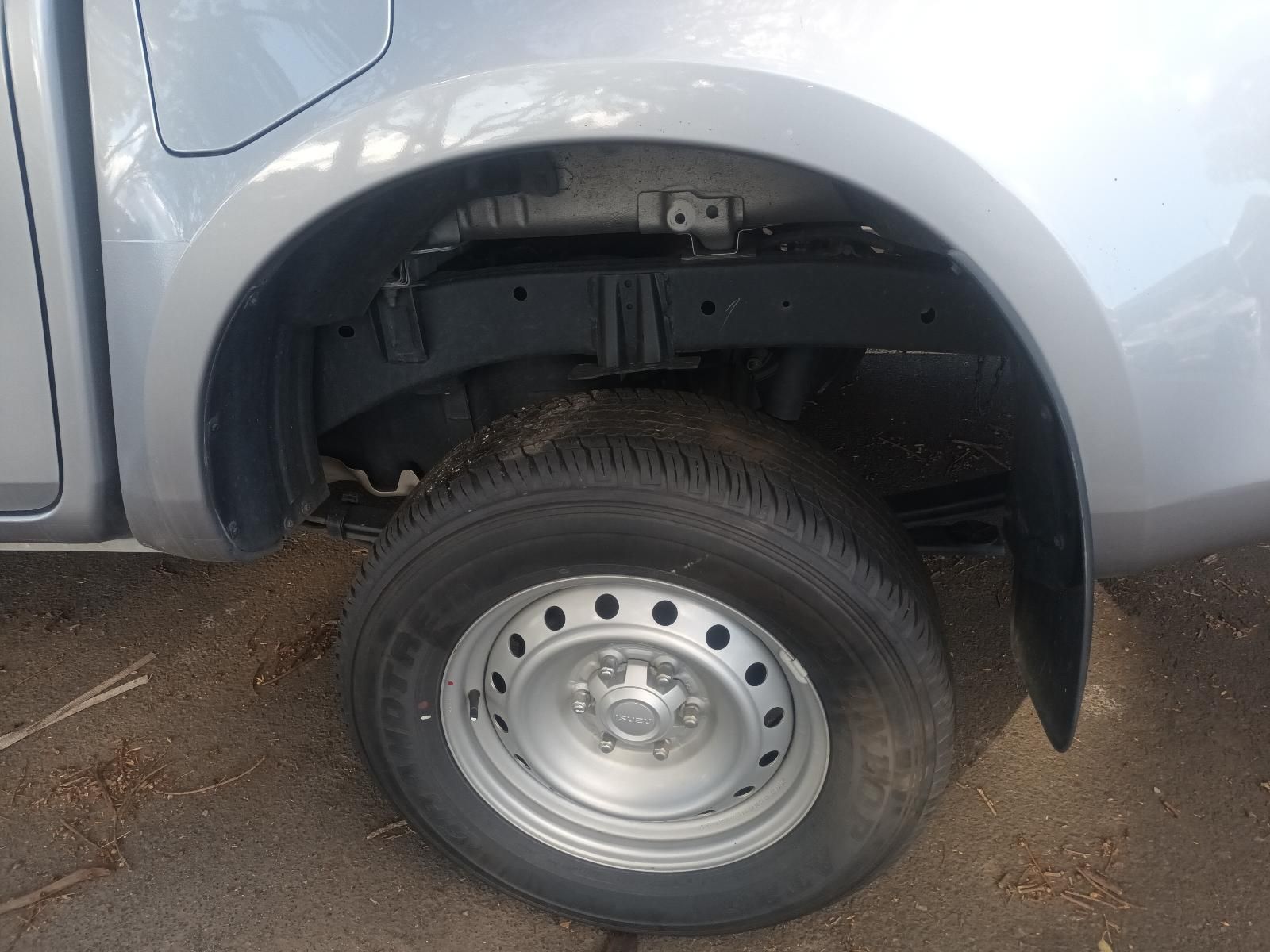 A Silver Truck is Parked on the Side of the Road — South West 4WD Wreckers In Brisbane, QLD