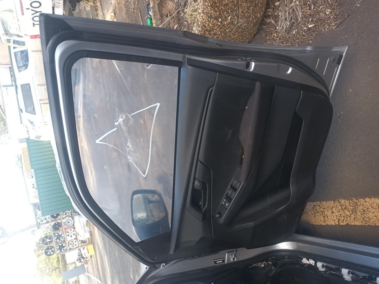 A Car with the Door Open and a Triangle Drawn on the Side of It — South West 4WD Wreckers In Brisbane, QLD