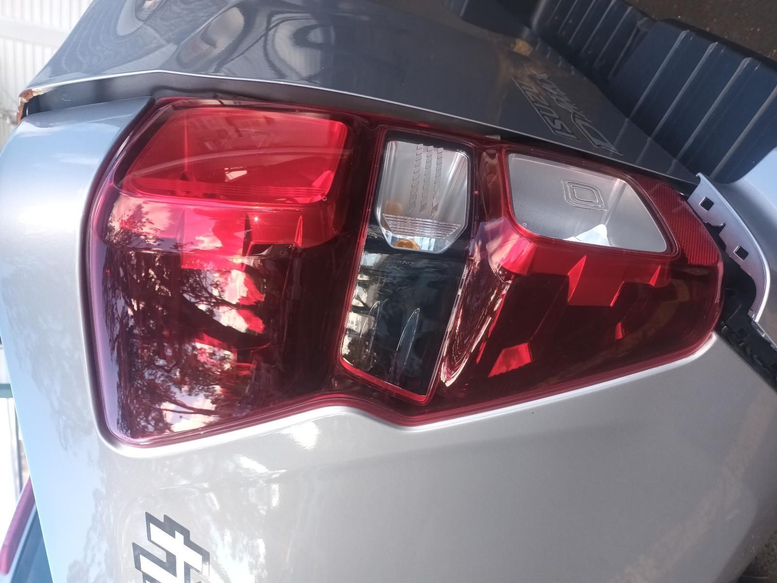A Close Up of a Silver Car with a Red Tail Light — South West 4WD Wreckers In Brisbane, QLD