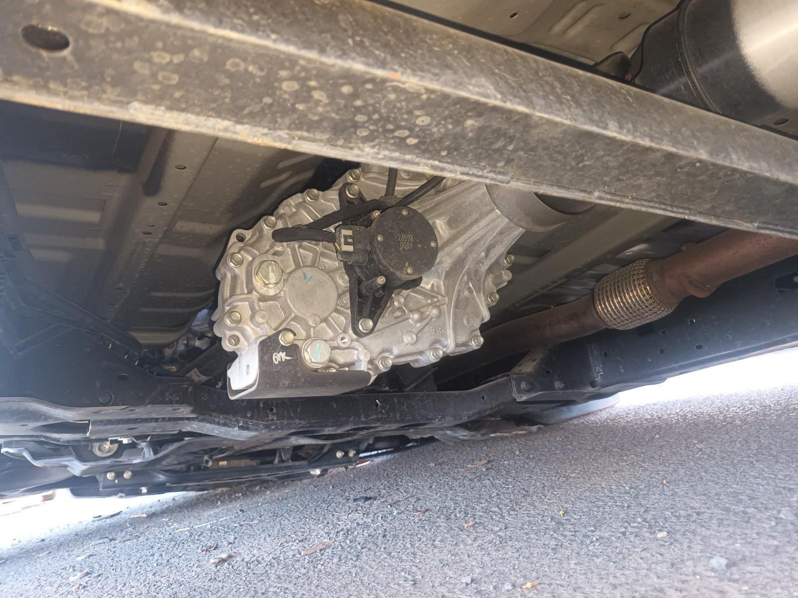 The Underside of a Car with a Gearbox and Exhaust Pipe — South West 4WD Wreckers In Brisbane, QLD