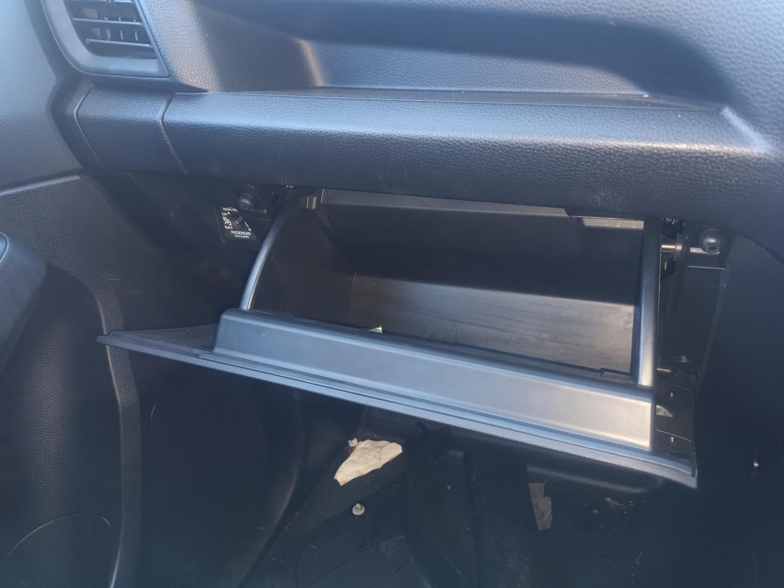 The Glove Box of a Car is Open and Empty — South West 4WD Wreckers In Brisbane, QLD