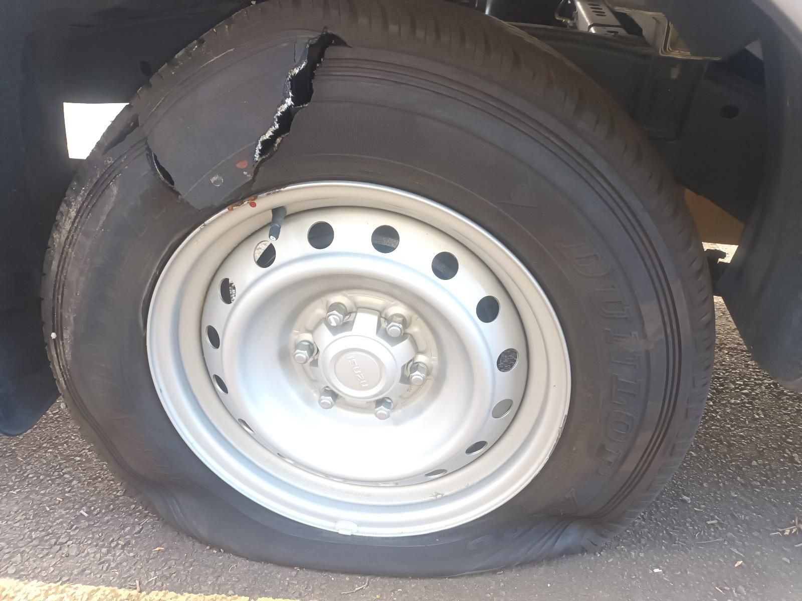 A Close Up of a Flat Tire on a Car — South West 4WD Wreckers In Brisbane, QLD
