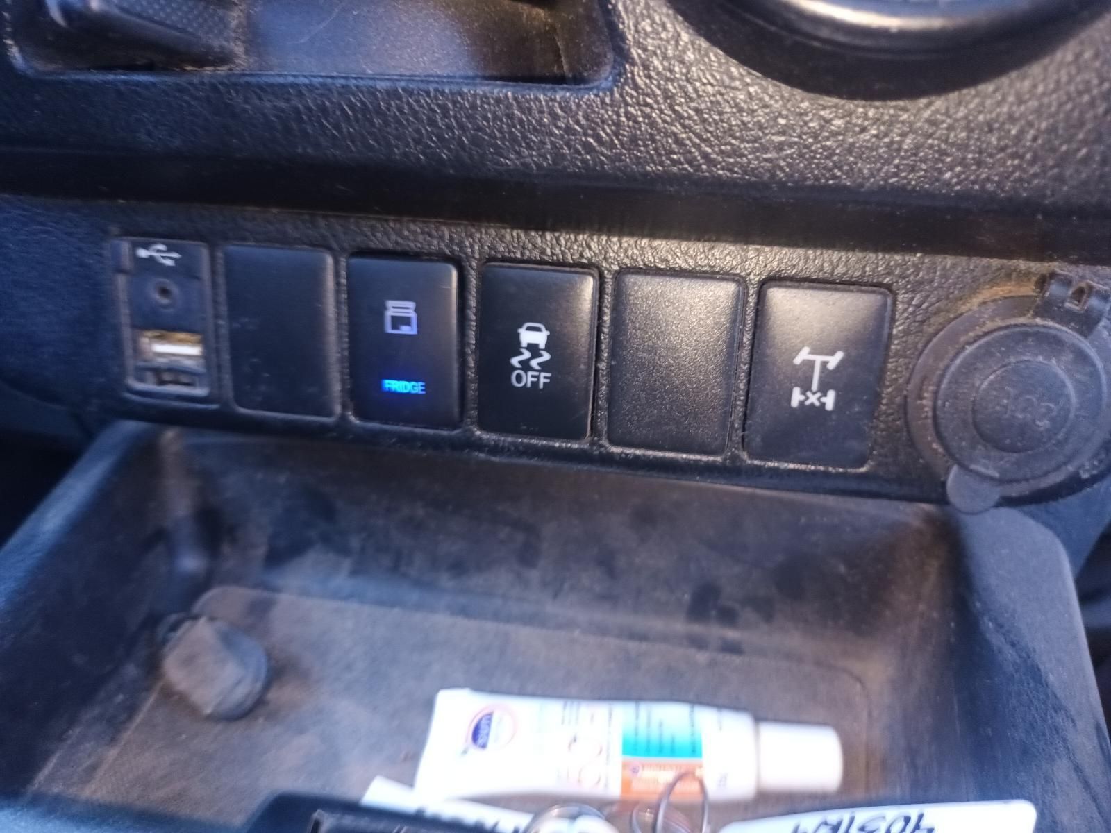 An Ointment Tube Sits in a Car Dashboard — South West 4WD Wreckers In Brisbane, QLD