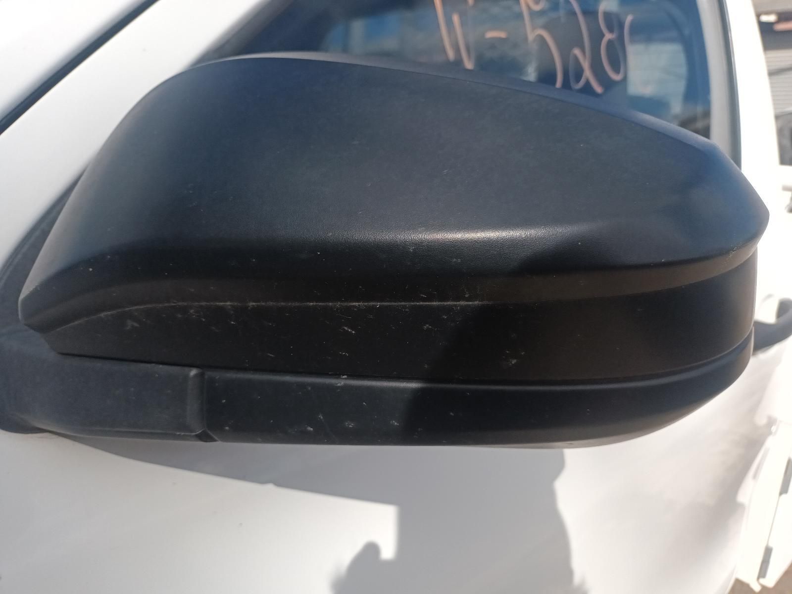 A Close Up of a Side View Mirror on a White Car — South West 4WD Wreckers In Brisbane, QLD
