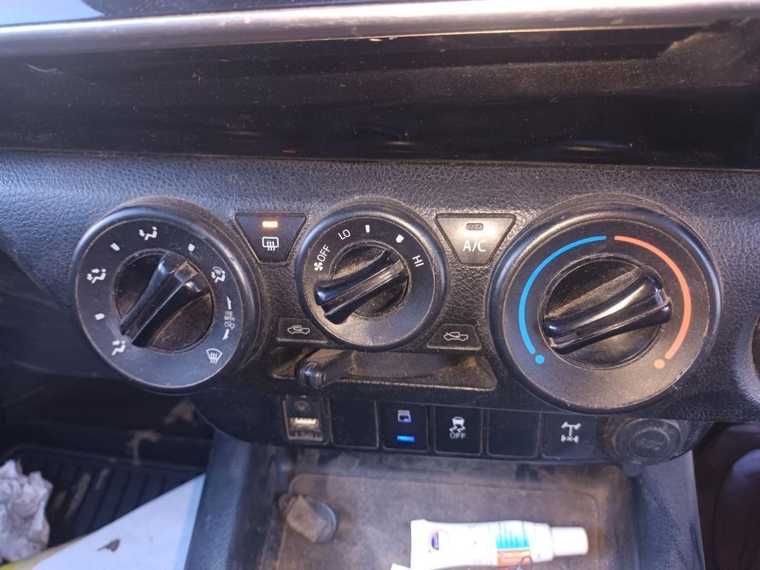 A Close Up of a Car Dashboard with a Tube of Ointment — South West 4WD Wreckers In Brisbane, QLD