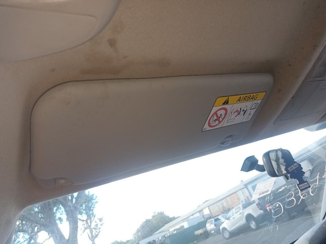 A Sun Visor is Hanging from the Ceiling of a Car — South West 4WD Wreckers In Brisbane, QLD