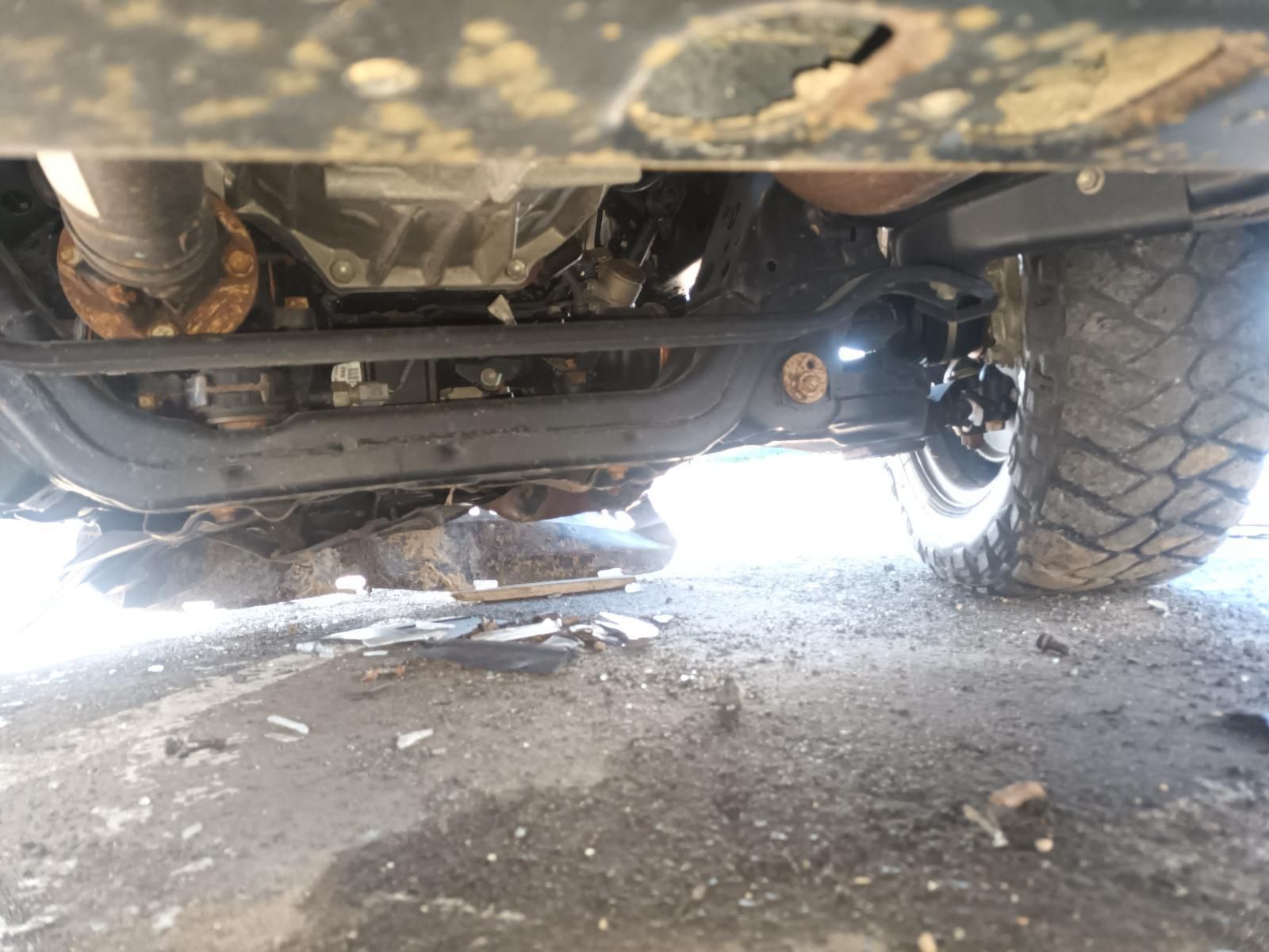 A Close Up of the Underside of a Car on the Ground — South West 4WD Wreckers In Brisbane, QLD