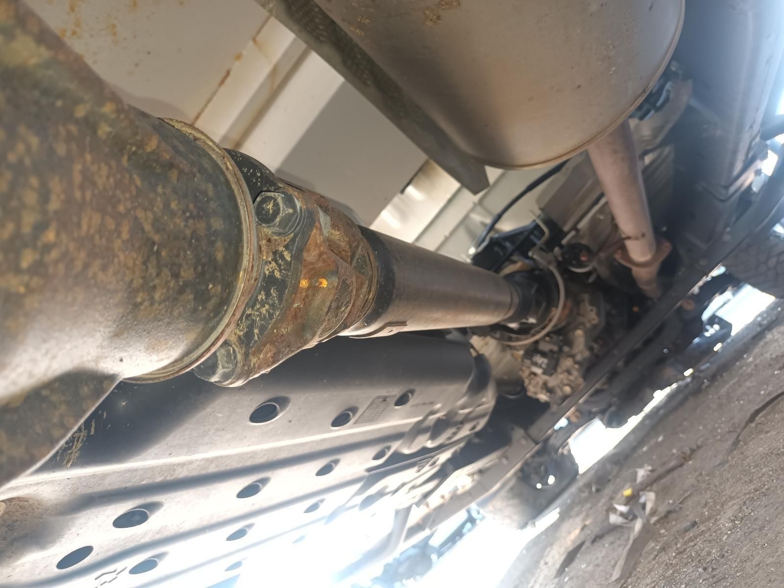 A Close Up of the Underside of a Car with an Exhaust Pipe — South West 4WD Wreckers In Brisbane, QLD