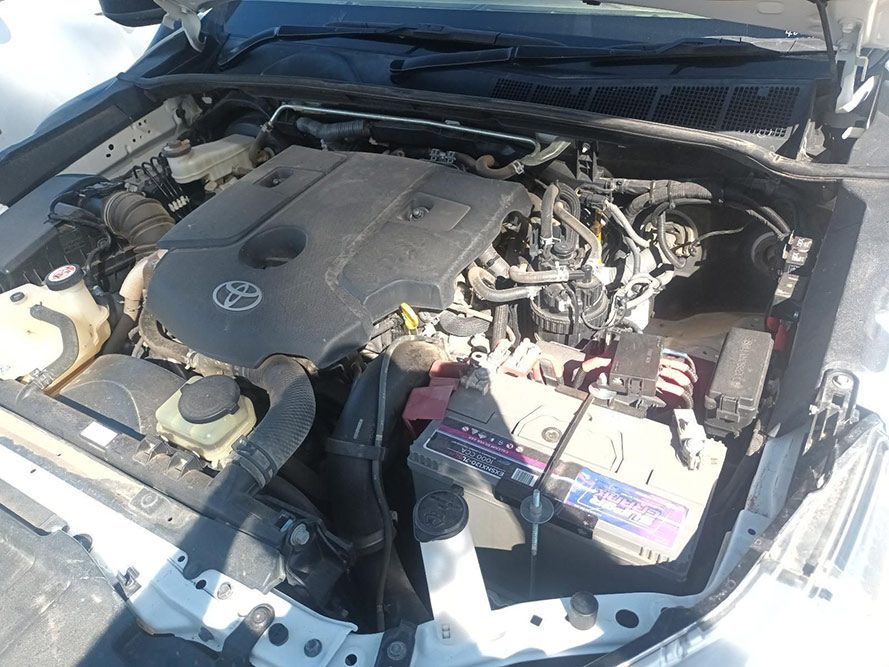The Engine of a Car is Shown with the Hood Open — South West 4WD Wreckers In Brisbane, QLD