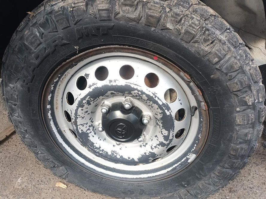 A Close Up of a Tire with Holes in It — South West 4WD Wreckers In Brisbane, QLD