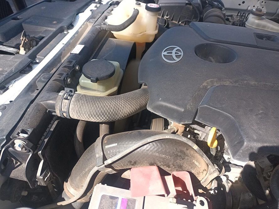 A Close Up of a Car Engine with a Toyota Logo on It — South West 4WD Wreckers In Brisbane, QLD