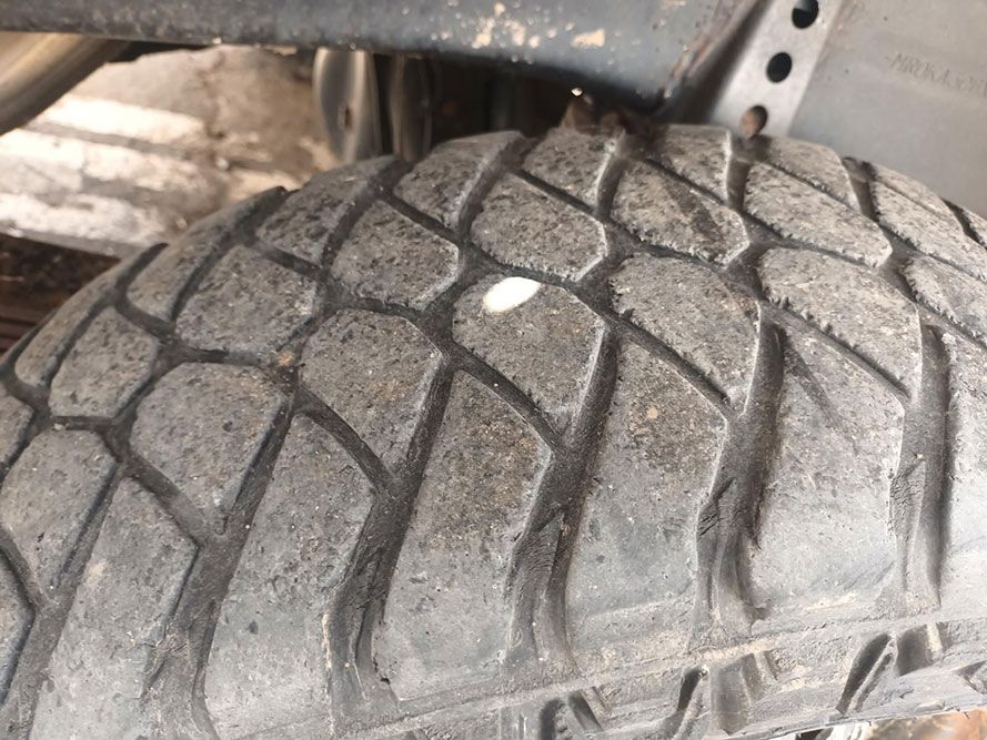 A Close Up of a Tire with a Hole in It — South West 4WD Wreckers In Brisbane, QLD