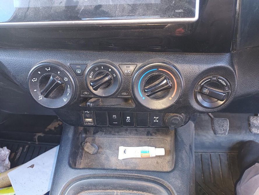 An Ointment Tube is Sitting on the Dashboard of a Car — South West 4WD Wreckers In Brisbane, QLD