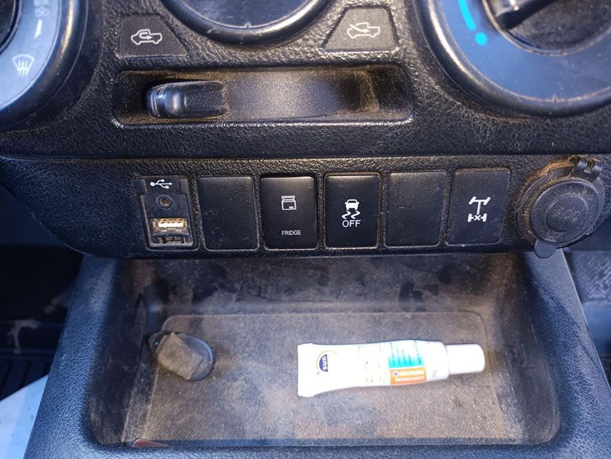 A Small Tube of Ointment is Sitting in a Car Dashboard — South West 4WD Wreckers In Brisbane, QLD