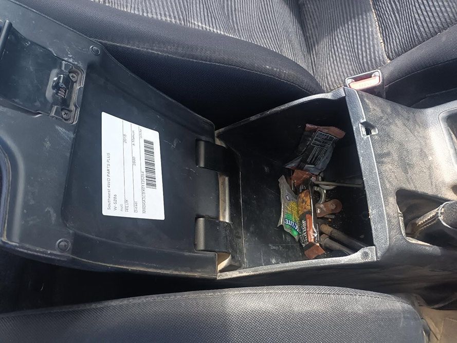 A Car Console with a Sticker on It — South West 4WD Wreckers In Brisbane, QLD