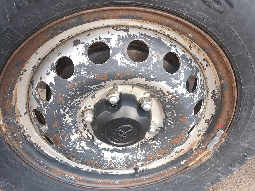A Close Up of a Wheel with a Toyota Logo on It — South West 4WD Wreckers In Brisbane, QLD